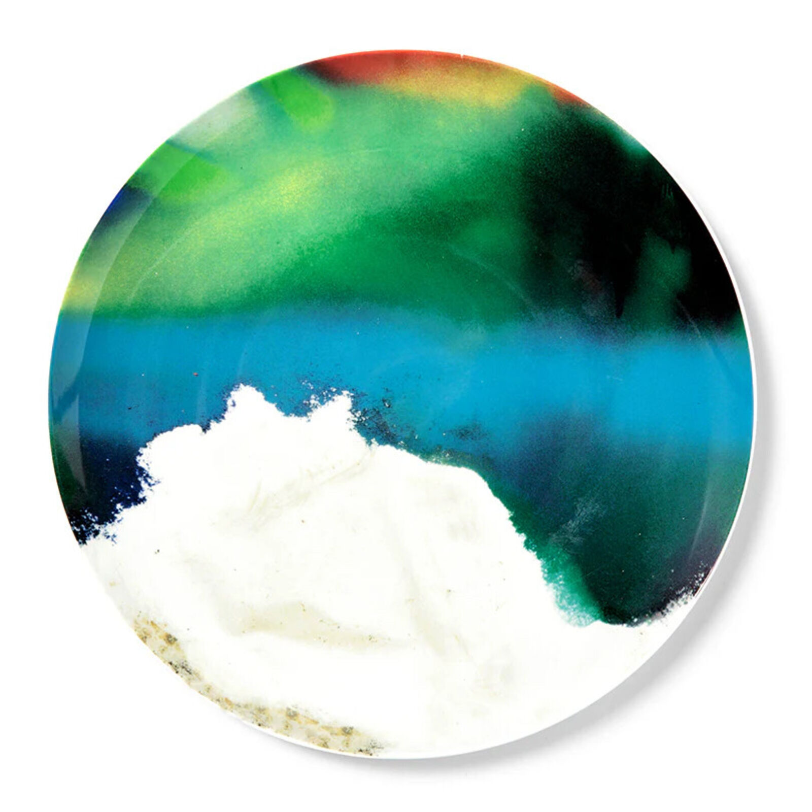A plate with a blue, green, red, and white painting on it.