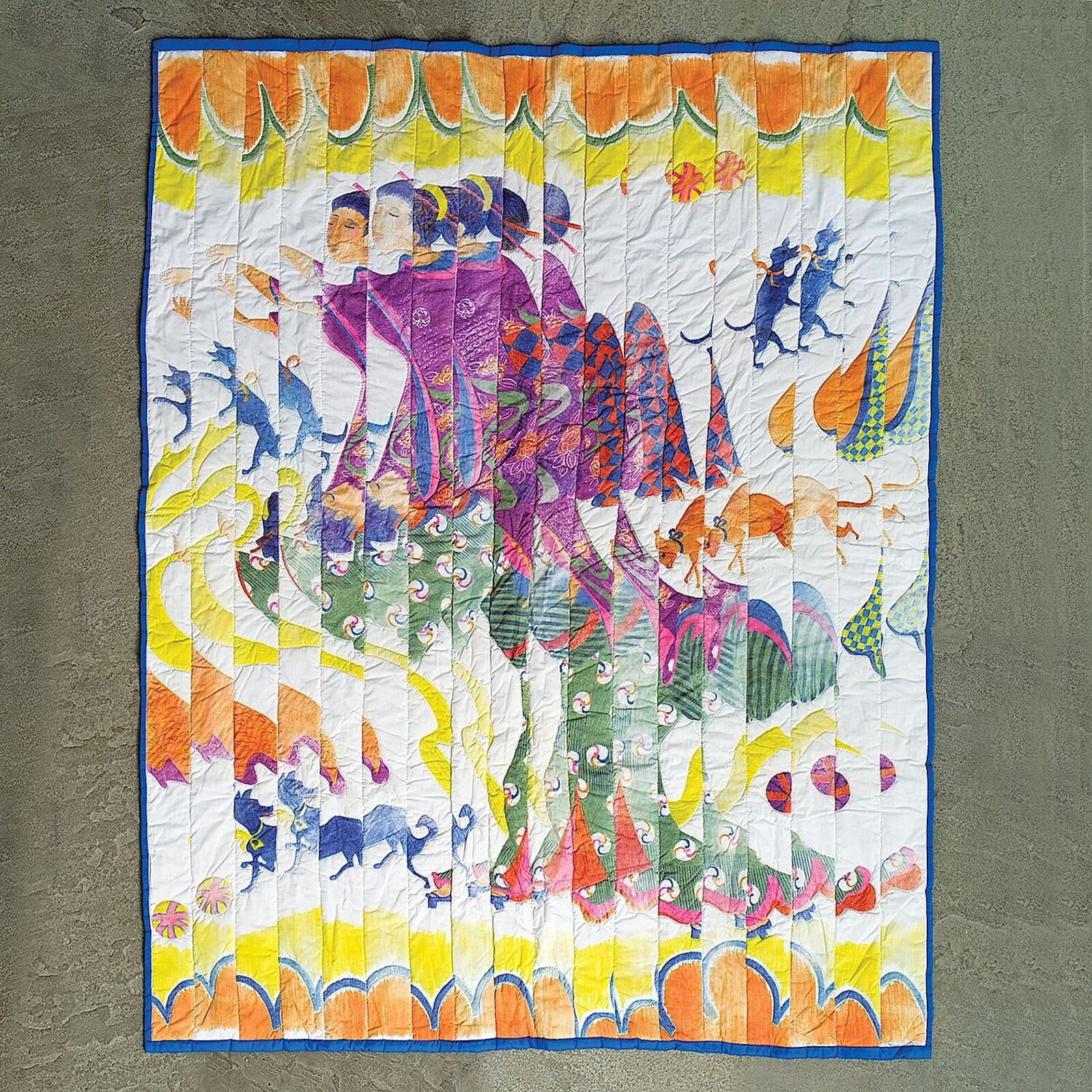 A colorful quilted tapestry featuring a whimsical scene of figures and animals against a bright, patterned background.
