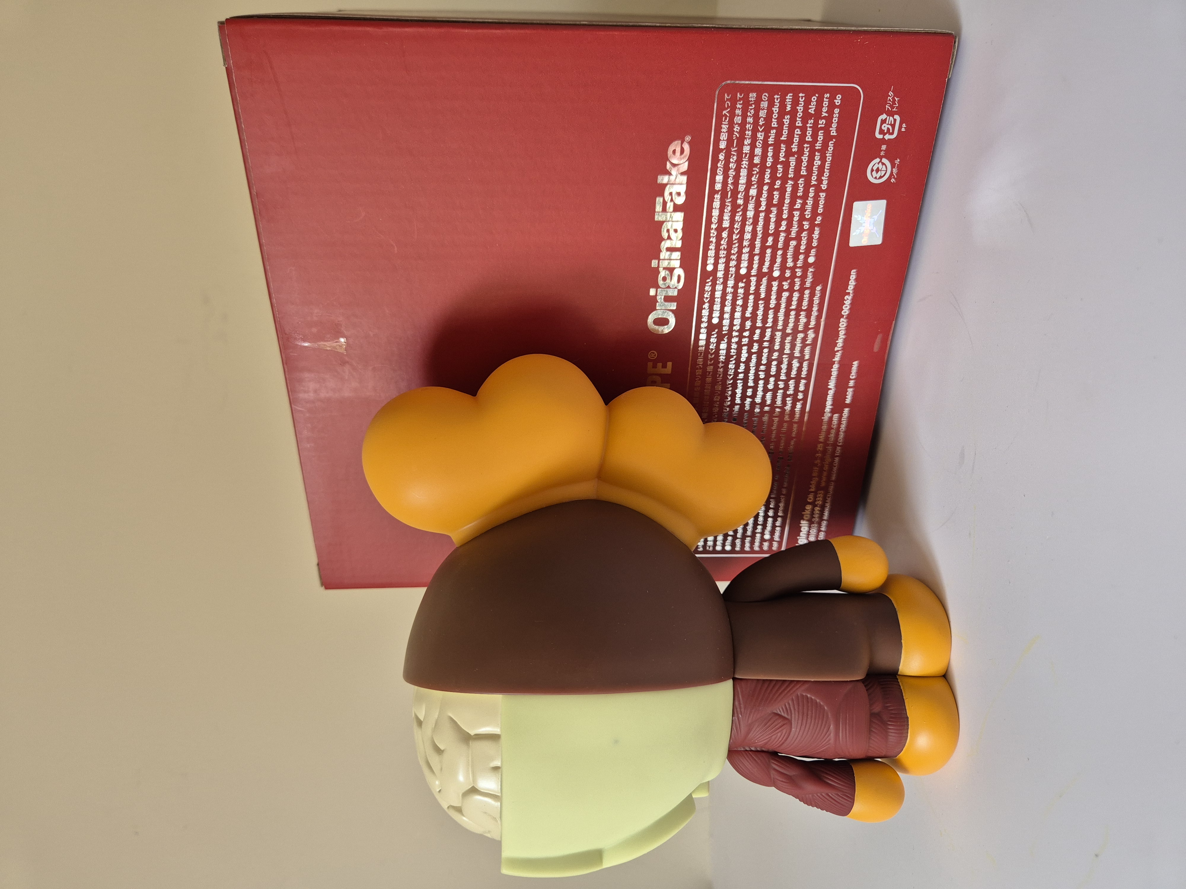 A toy that is sitting on top of a wall.