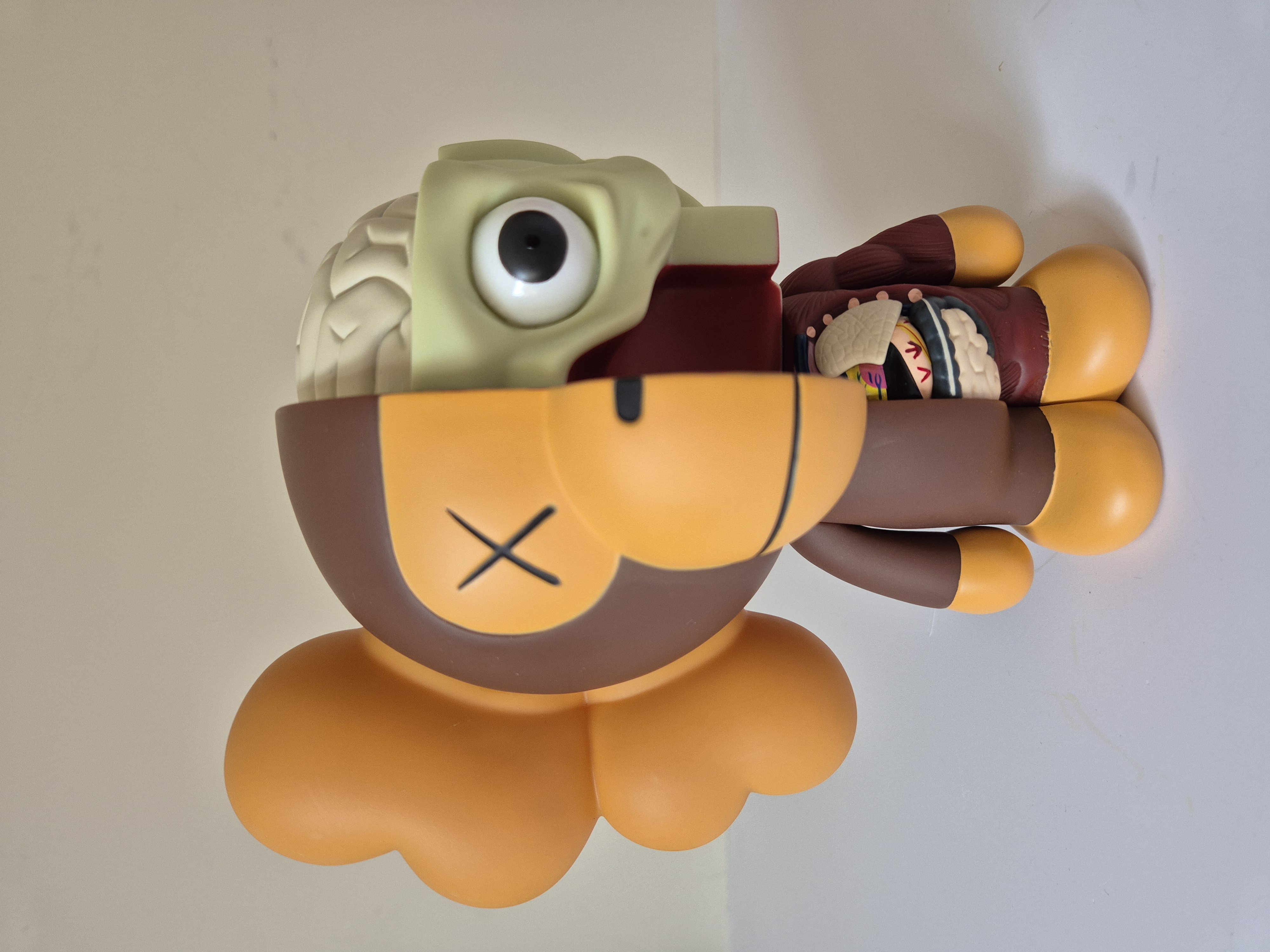 A toy that is sitting on top of a wall.