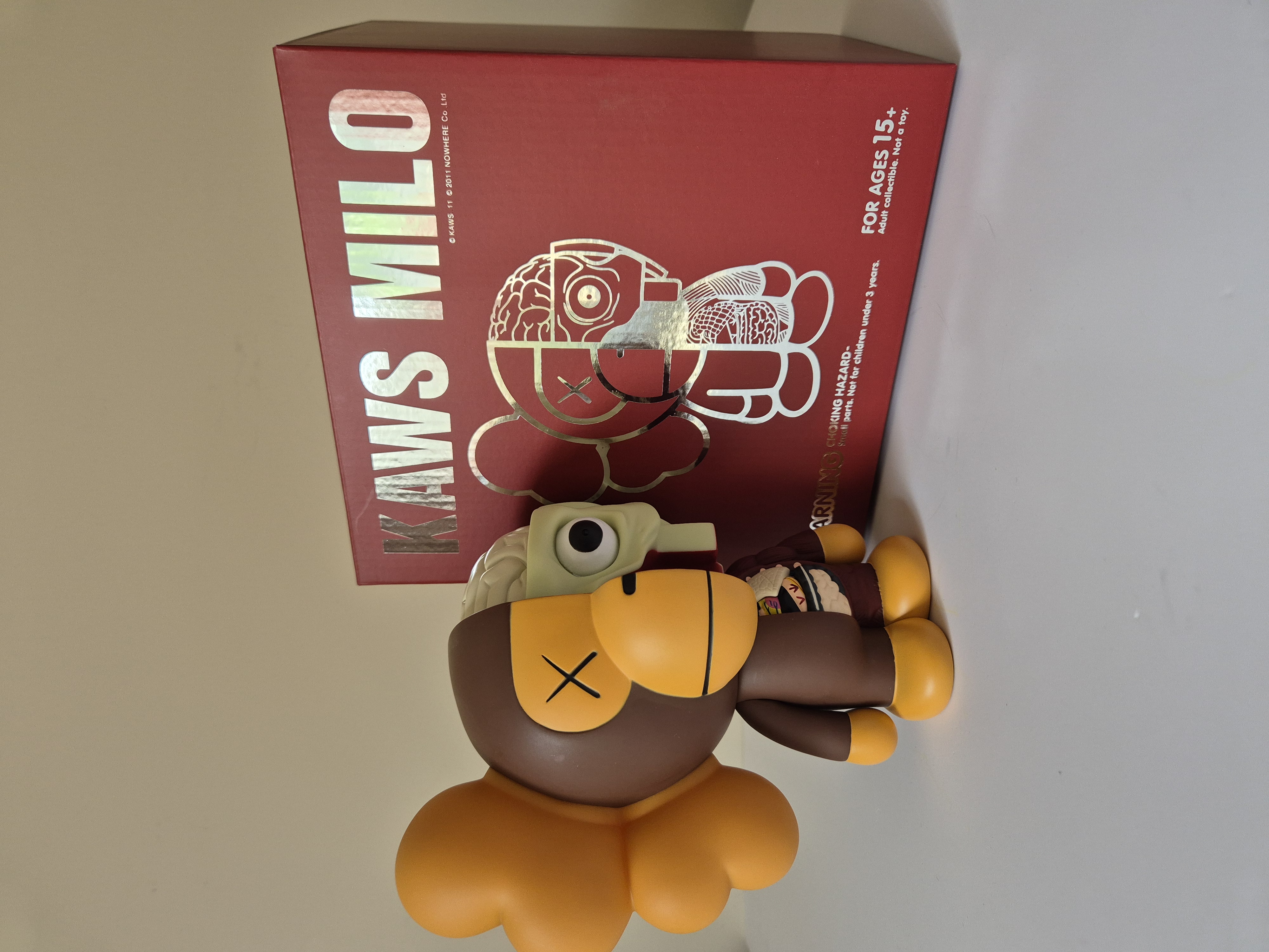 A toy that is sitting on top of a wall.