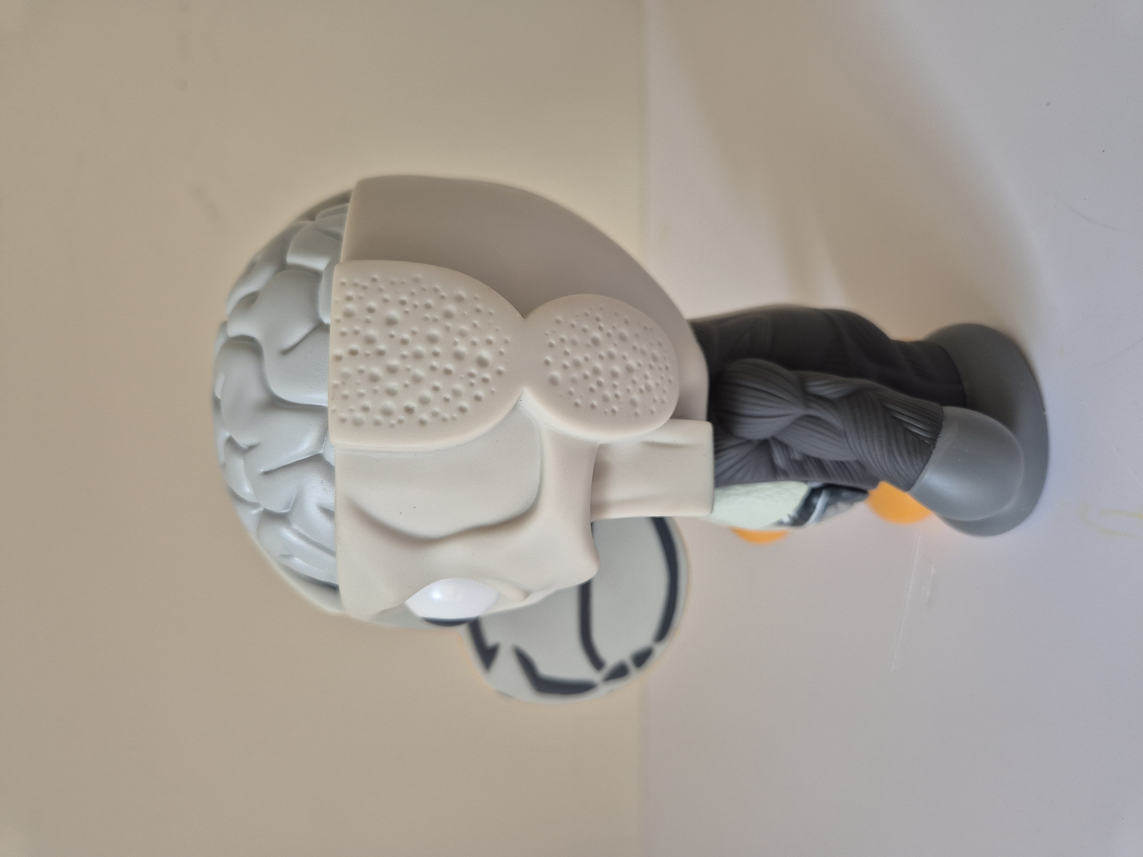 A toy that is sitting on top of a wall.