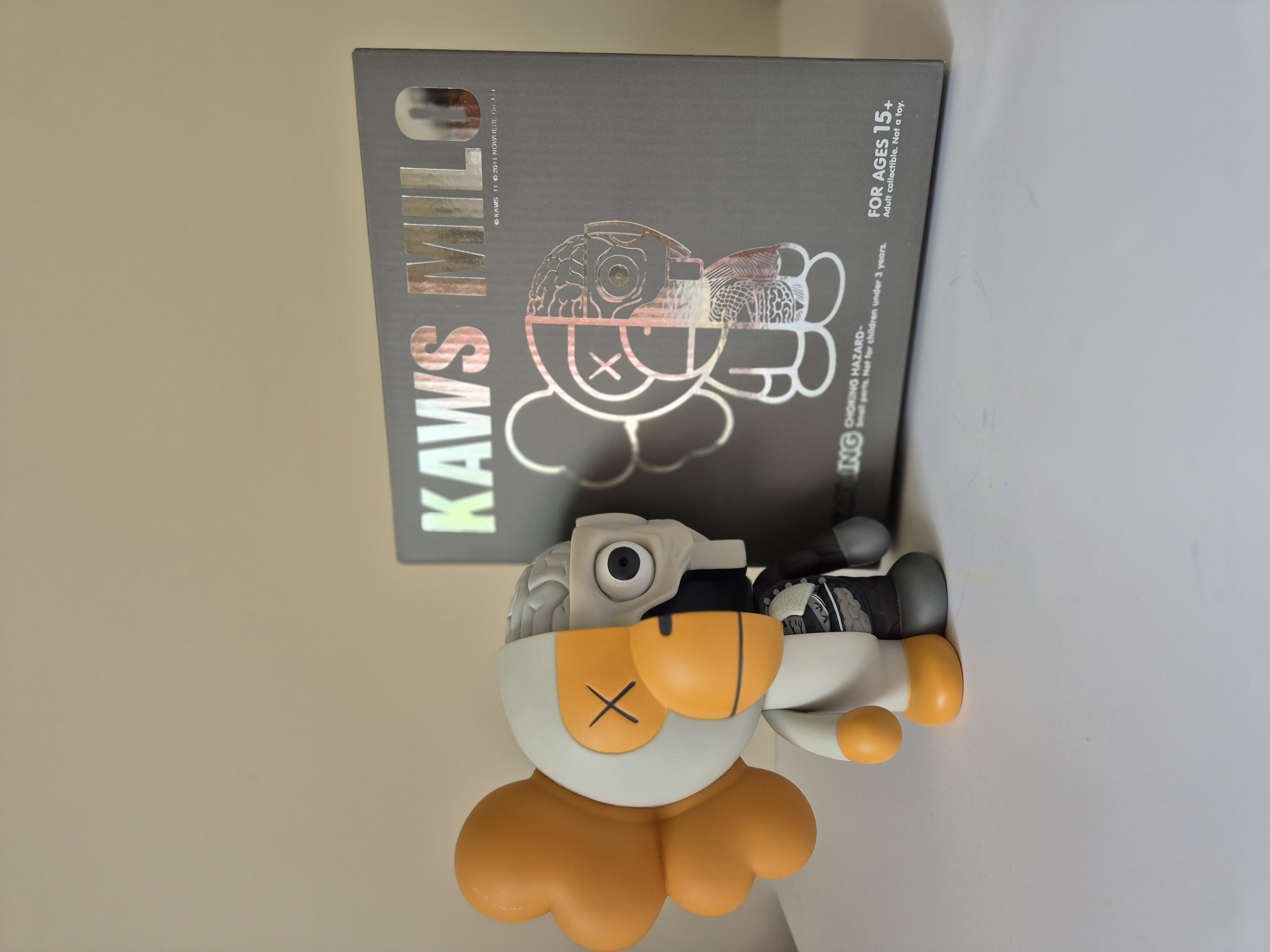 A toy that is sitting on top of a wall.