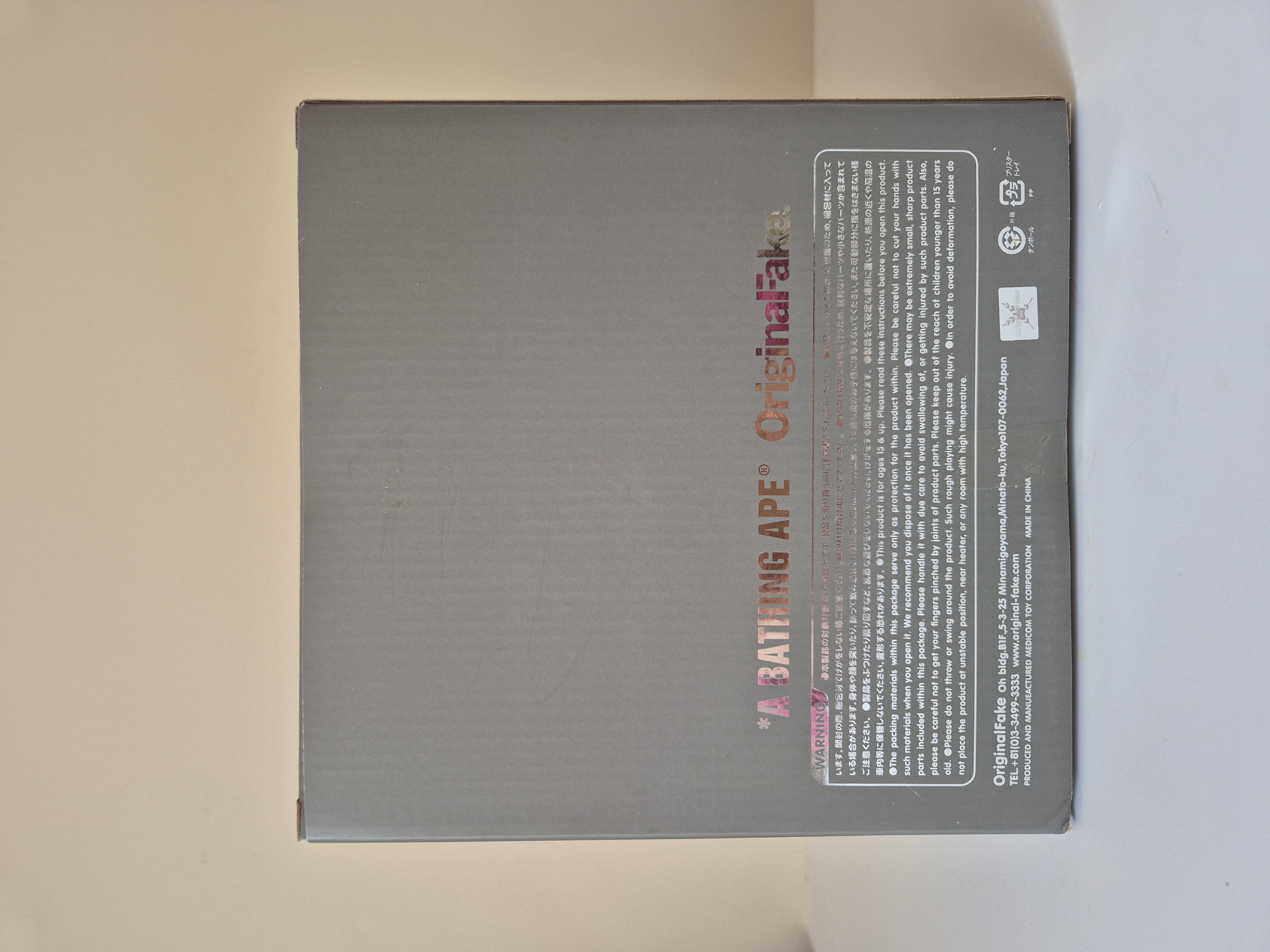 A toy that is sitting on top of a wall.