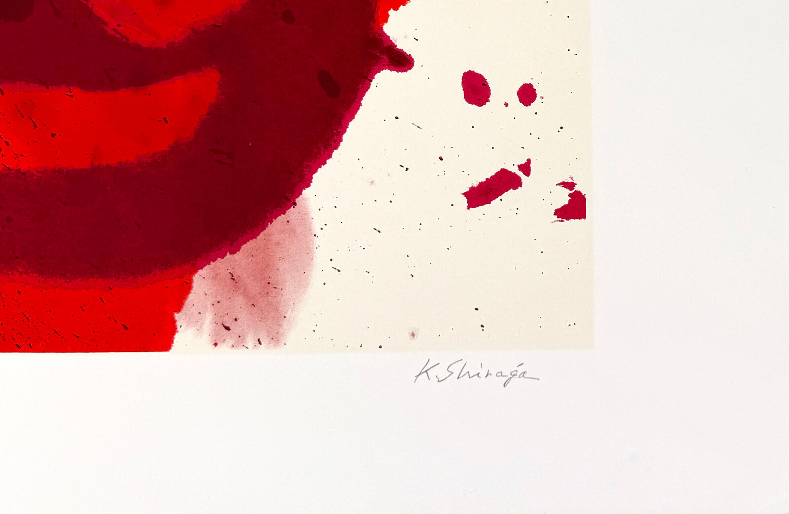 A red and white painting on a white background.