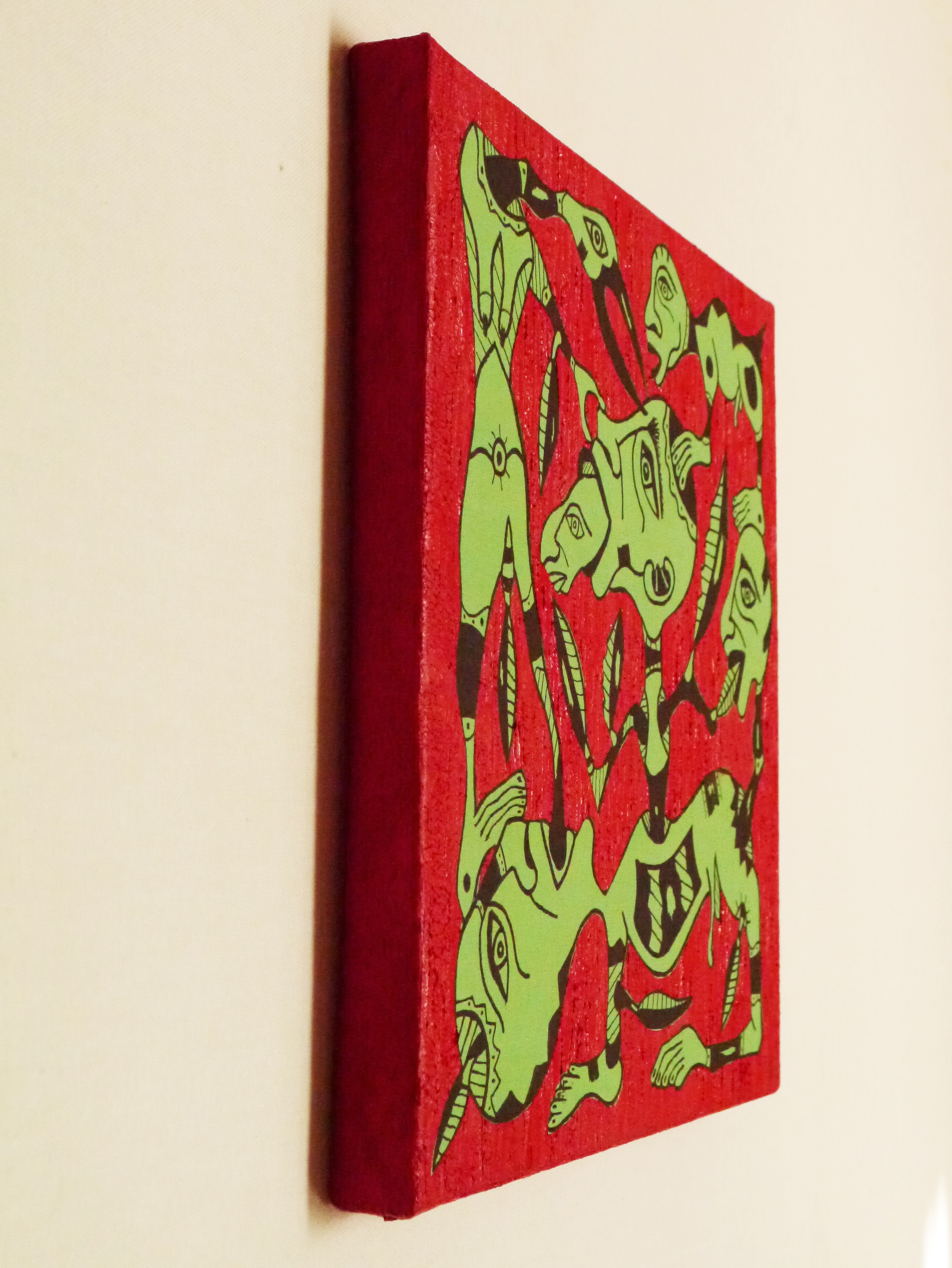 A painting of a group of people on a red background.