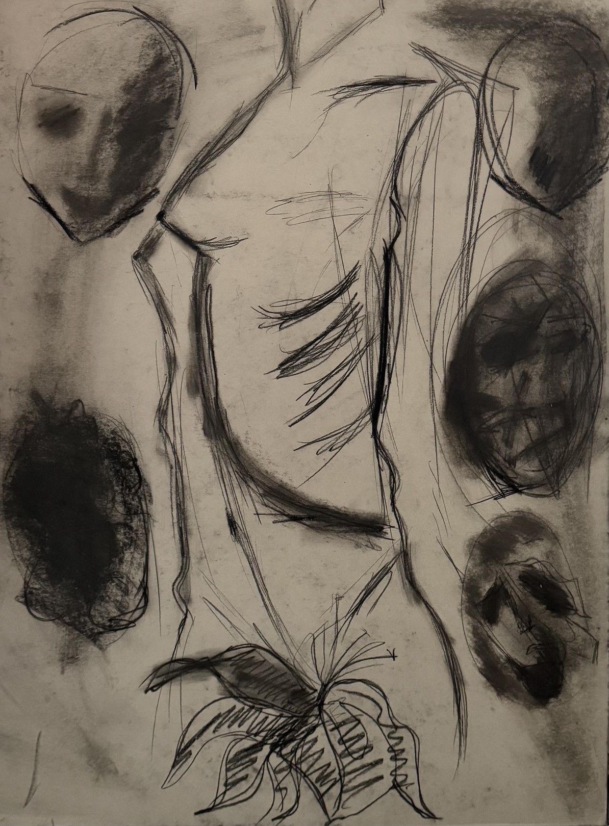 A black and white drawing of a woman's face surrounded by circles.