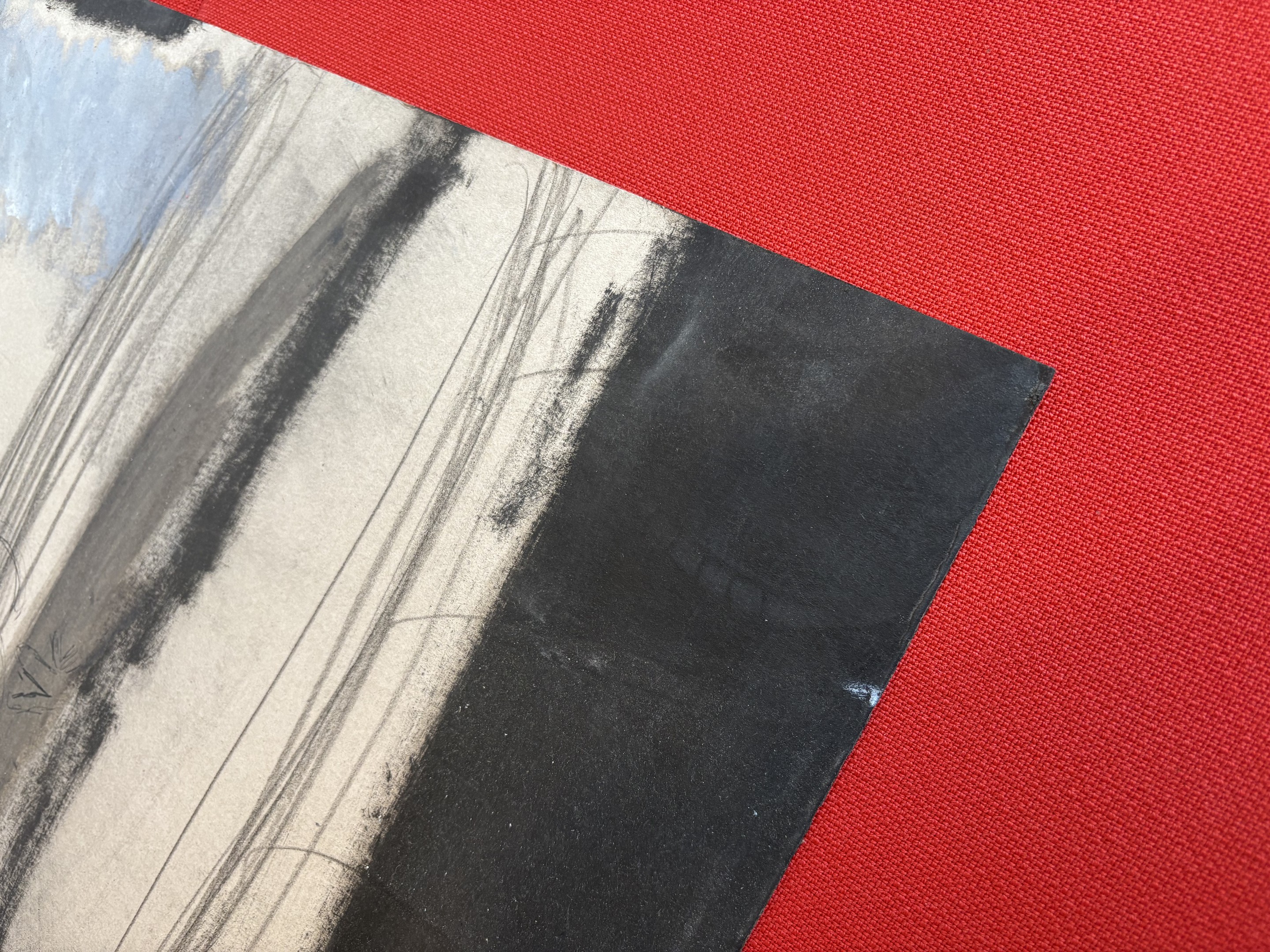 A split-panel artwork featuring abstract figures against a red polka-dot backdrop.
