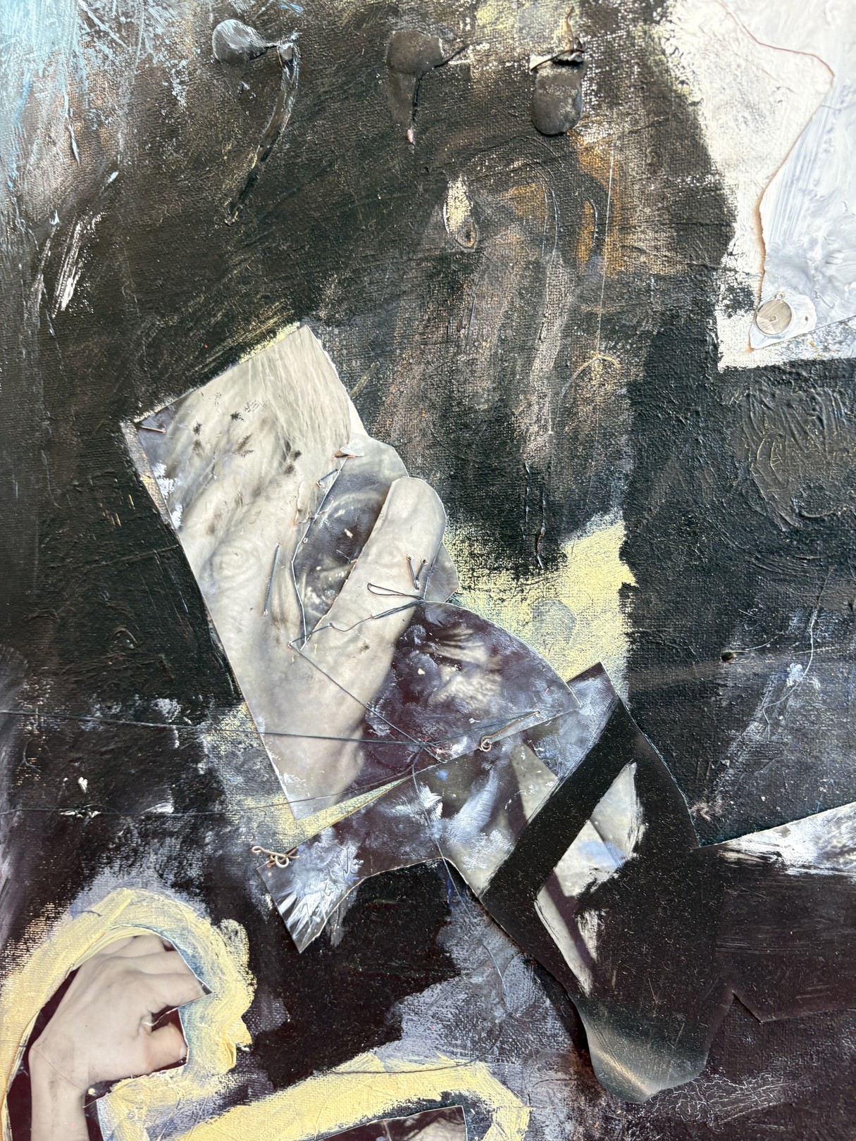 An abstract expressionist oil painting on canvas featuring a figure in shadow against a red surface.
