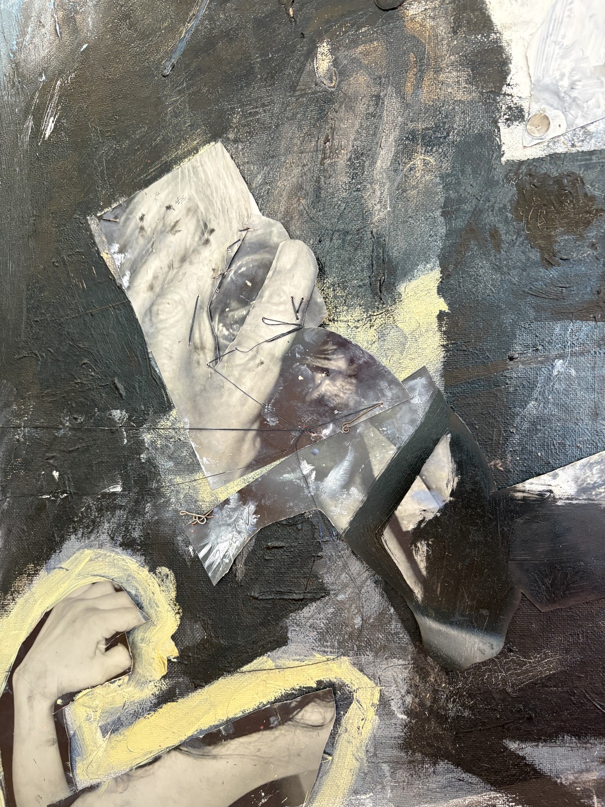 An abstract expressionist oil painting on canvas featuring a figure in shadow against a red surface.