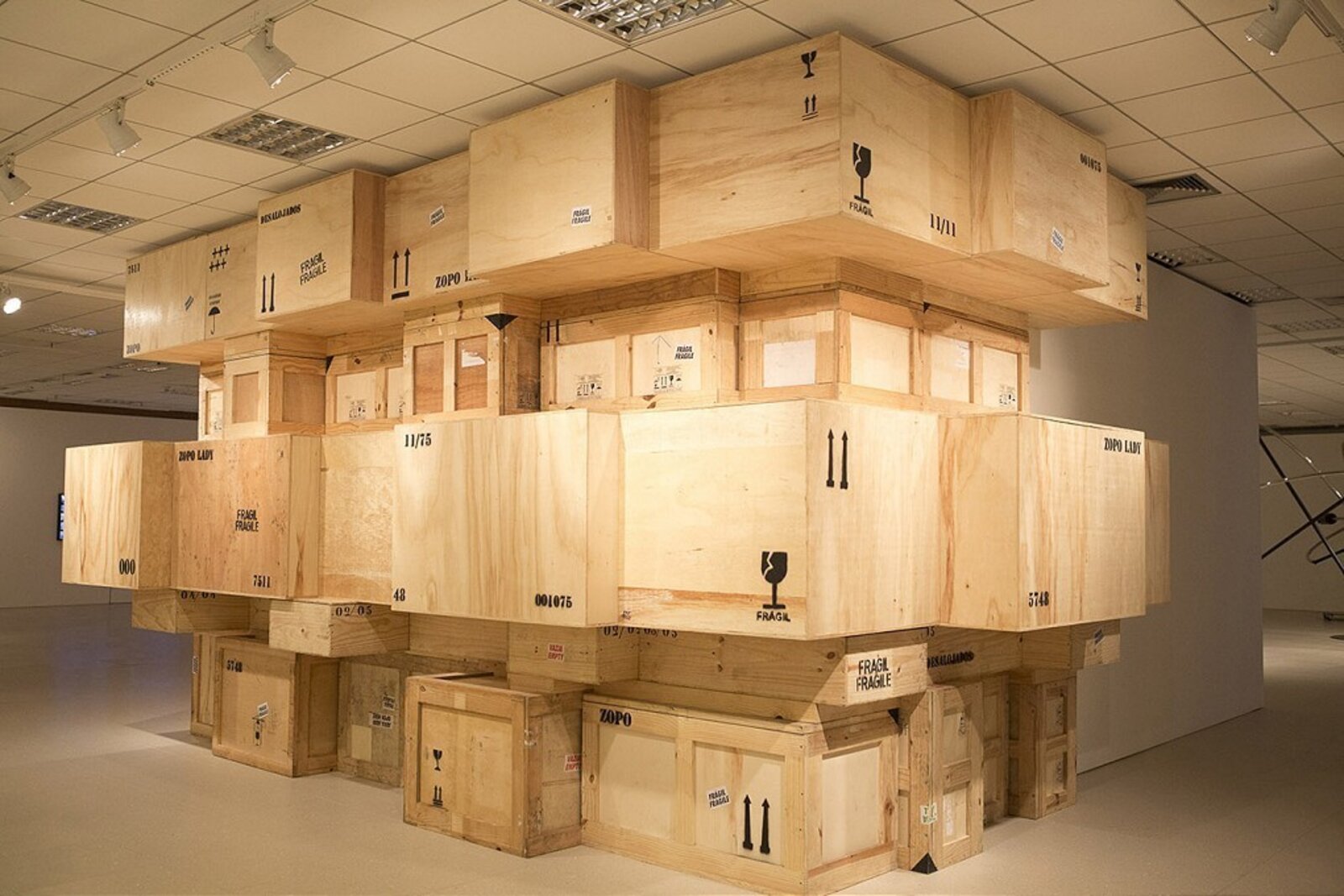 Artwork by Kiluanji Kia Henda, Concrete Affection – Zopo Lady, Made of Single channel video, colour, sound, crates 