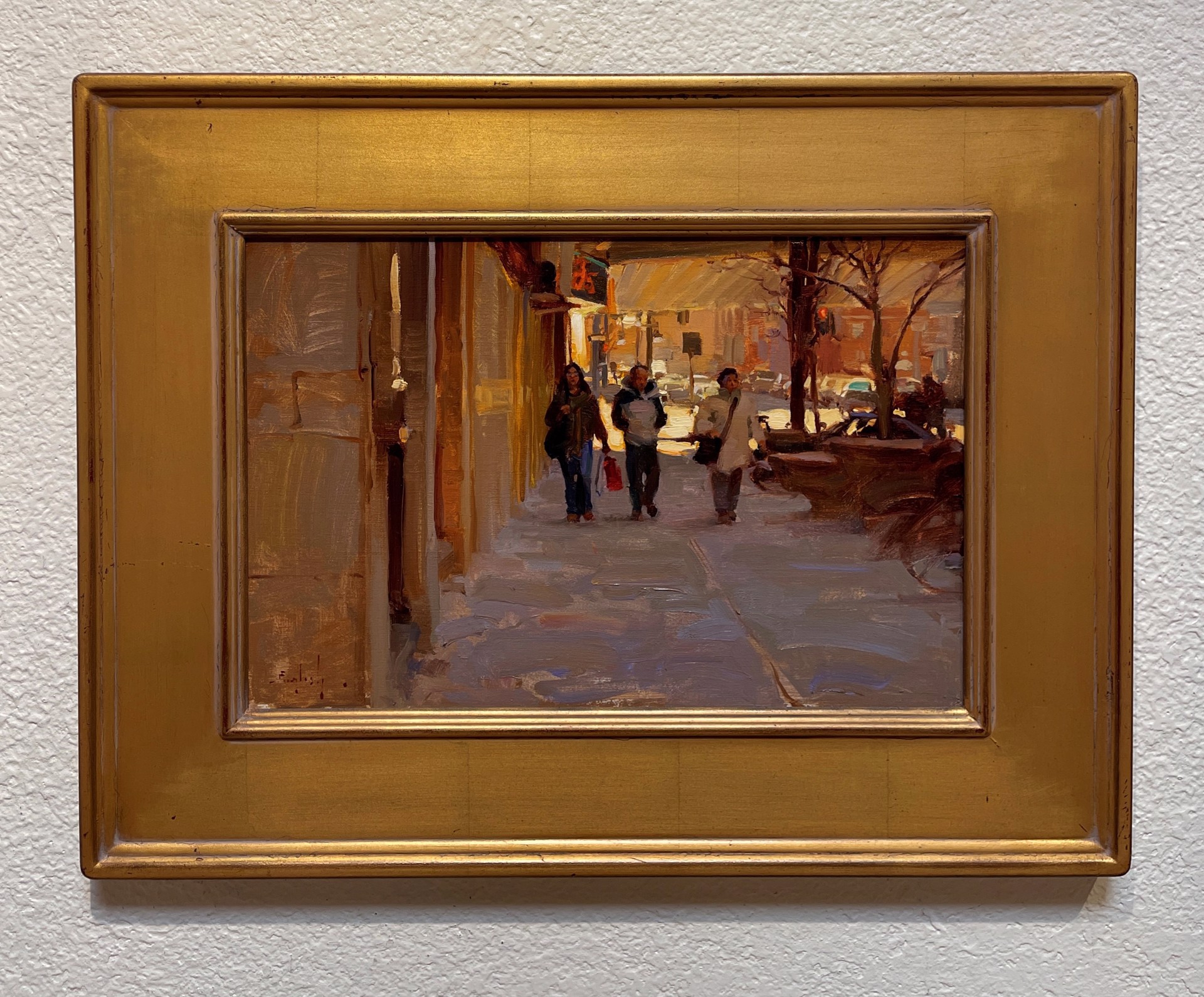 A painting of people walking down a snowy street.