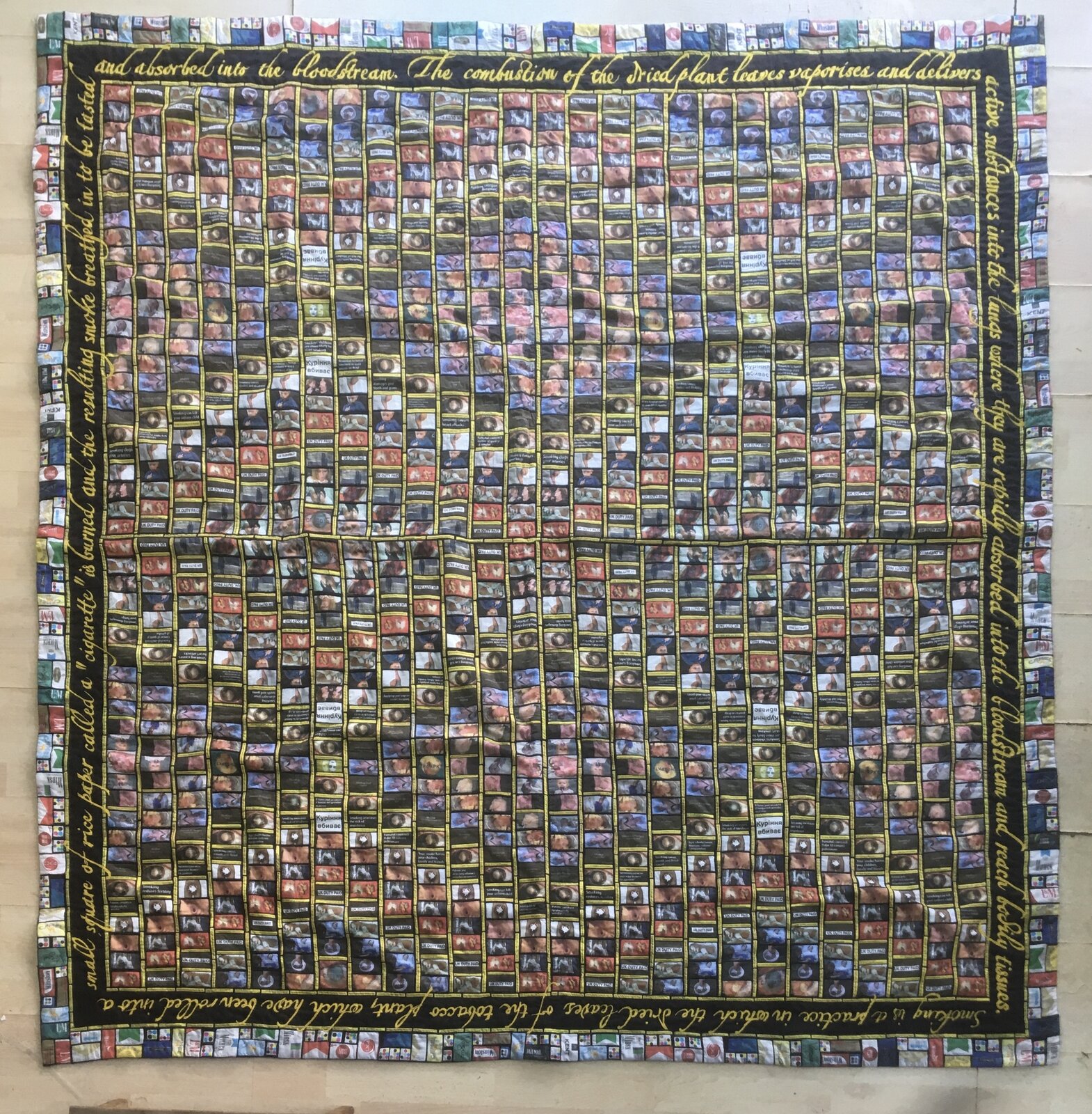 A large quilt composed of hundreds of small tobacco pack images arranged in a grid, framed by text describing the effects of smoking.