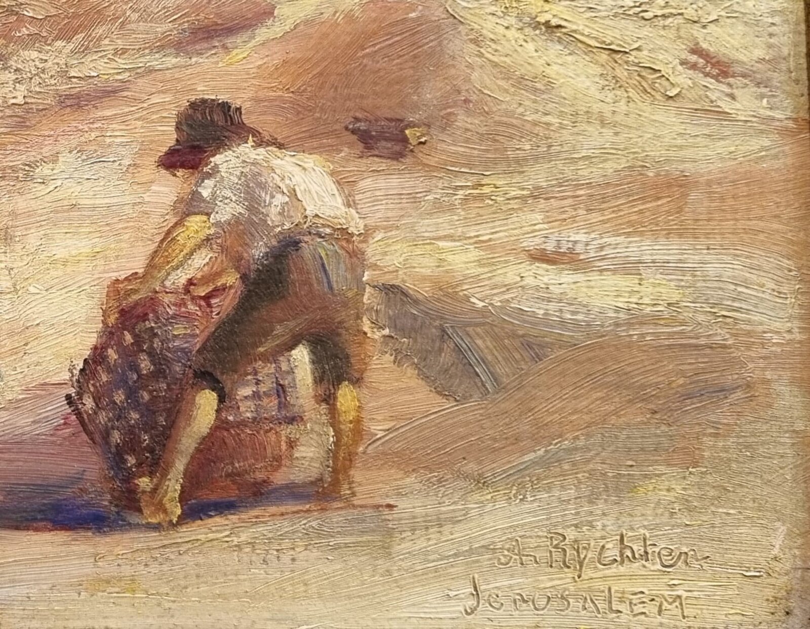 A sun-drenched street scene with figures resting near a large building.