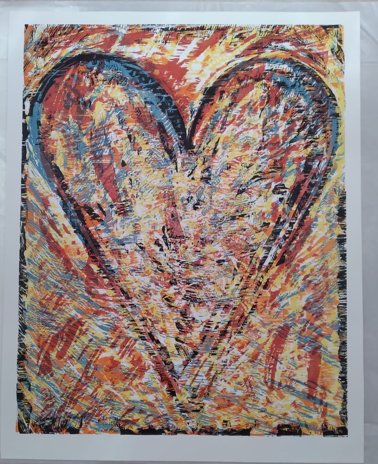 A triptych of expressive linocut prints featuring a stylized face, a heart shape, and abstract forms.