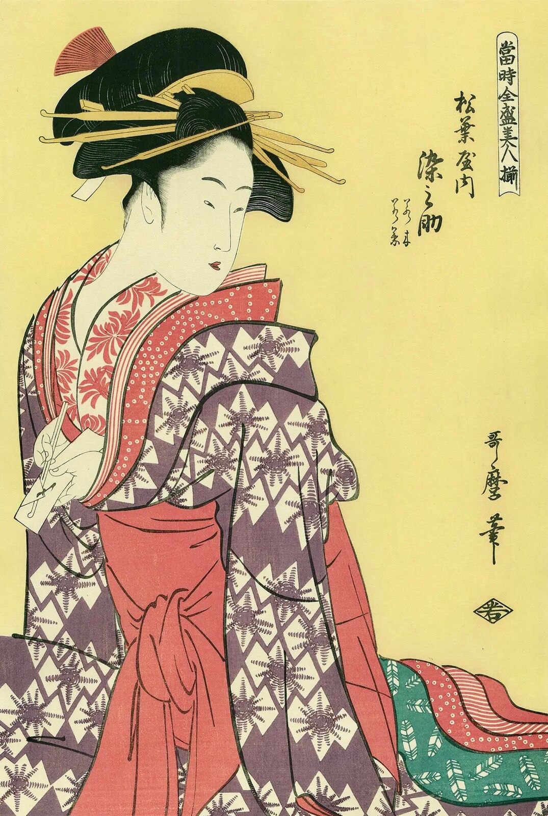 A woman in a kimono sitting on a chair.