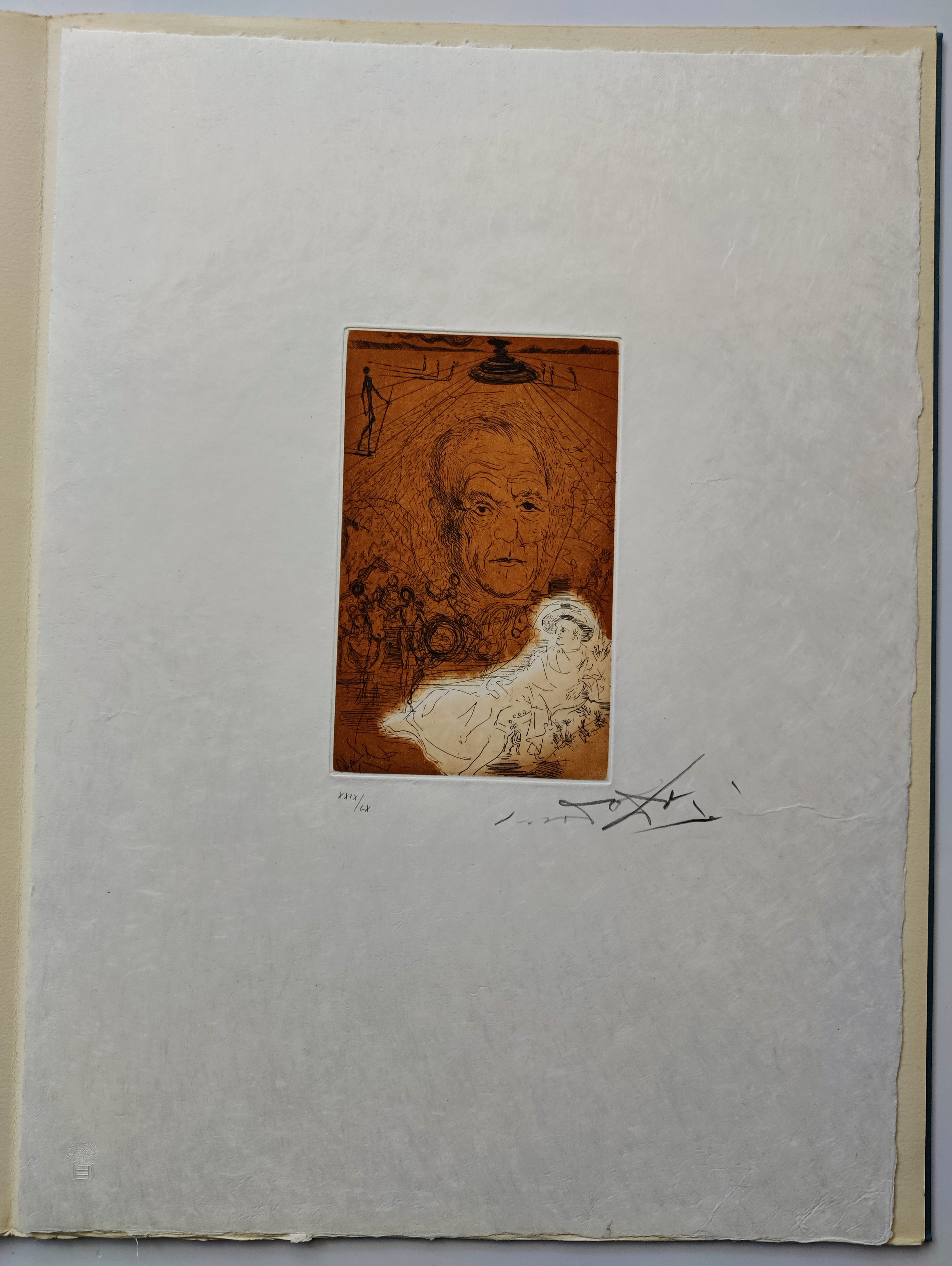A book with a drawing of a woman's face on it.