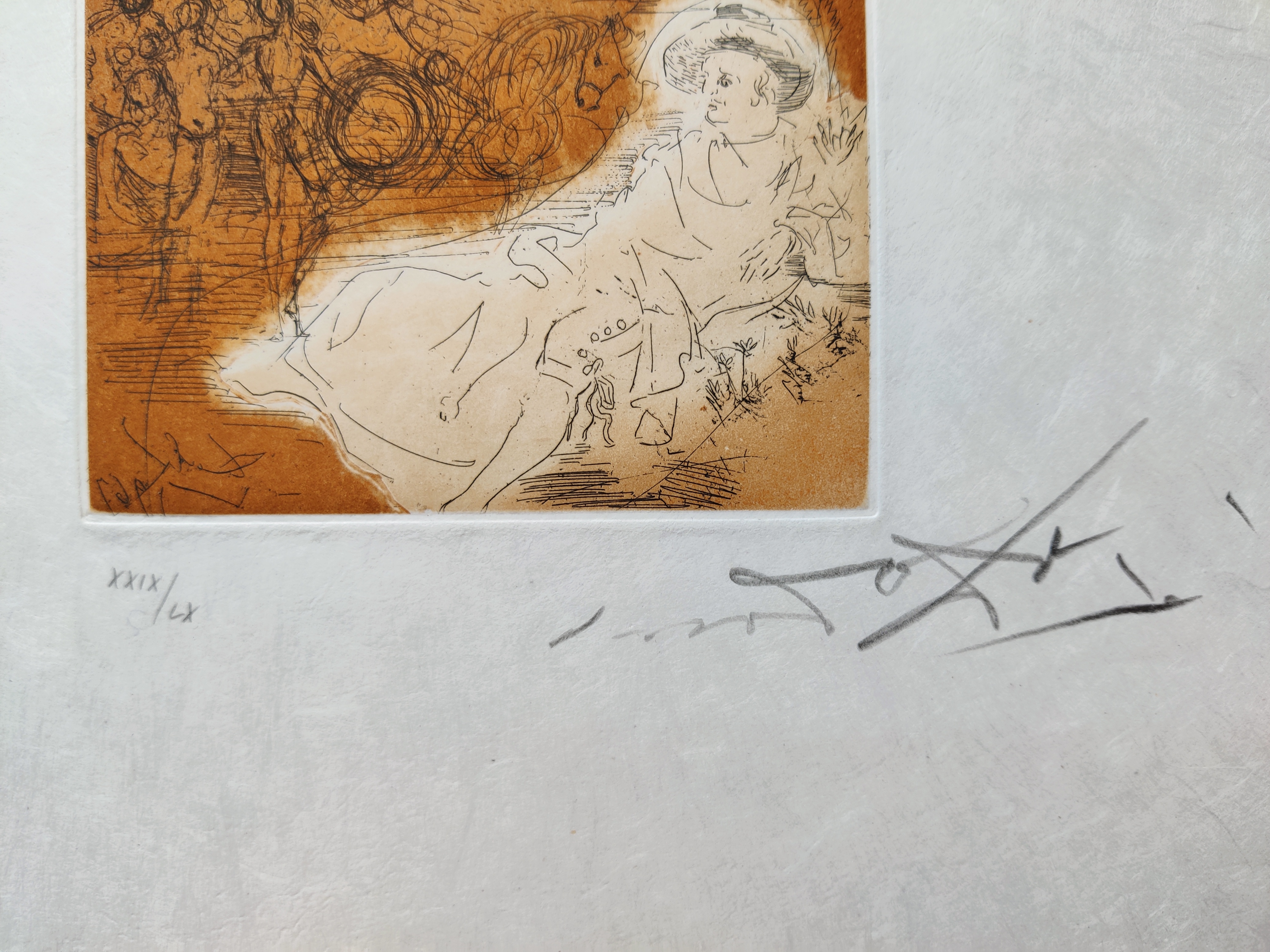 A book with a drawing of a woman's face on it.