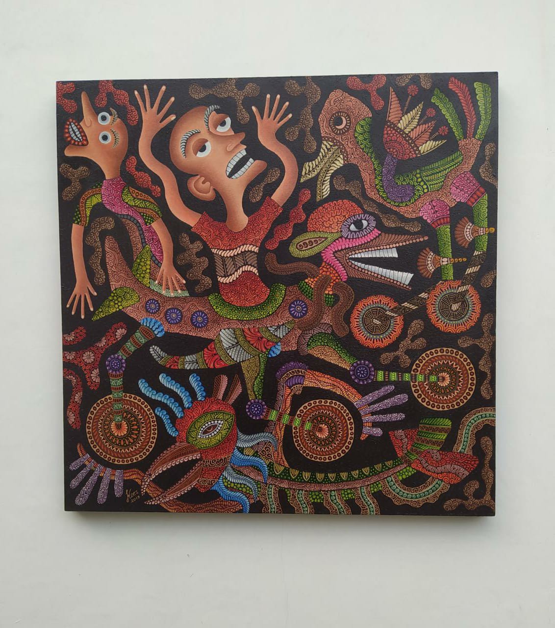 A vibrant, dot-painted artwork featuring a central figure surrounded by mythical creatures and abstract symbols.