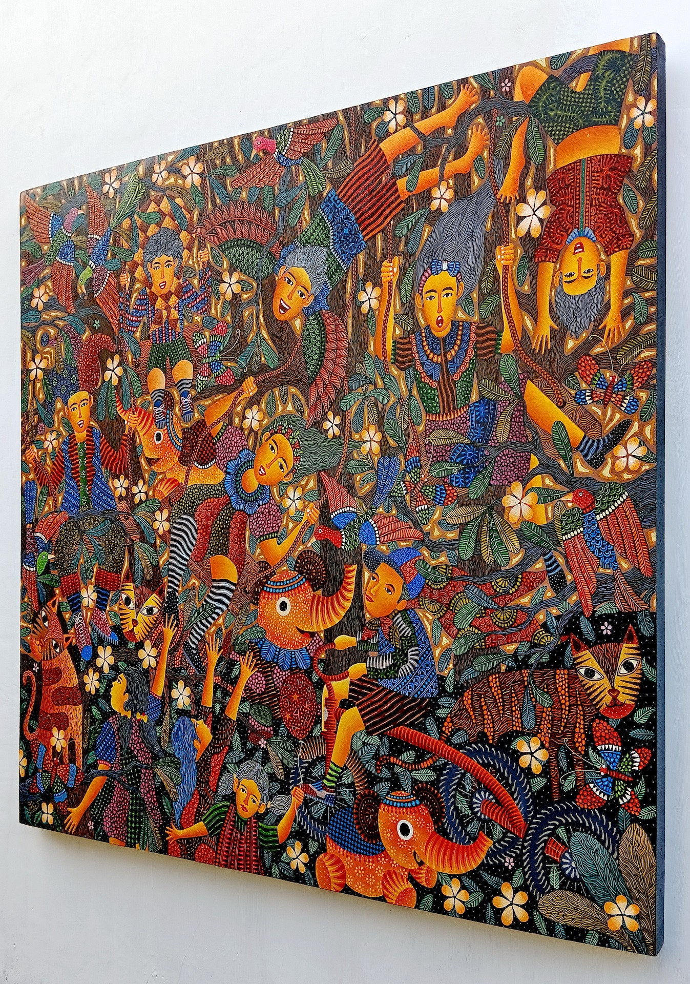 A painting on a wall in a room with a white wall.