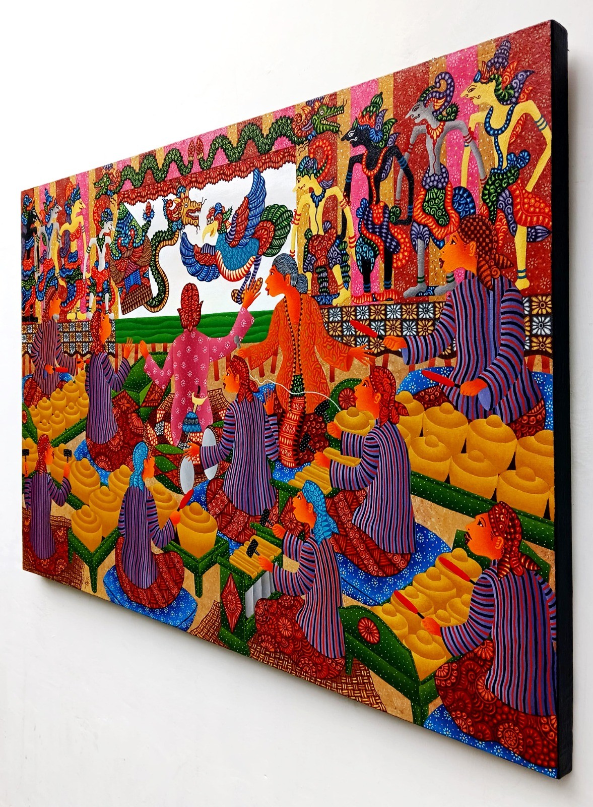 A vibrant, stylized scene of figures in colorful striped robes sharing a feast under a decorative canopy.