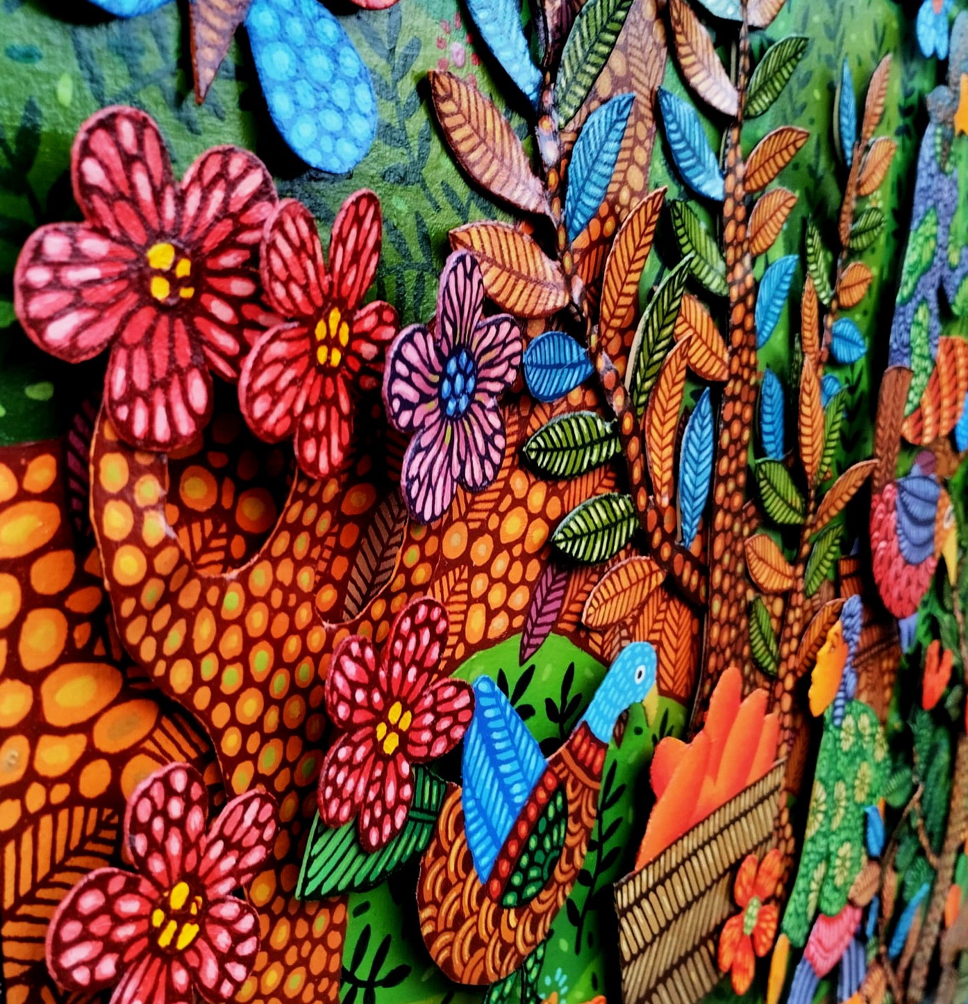 A colorful painting on a wall in a room.
