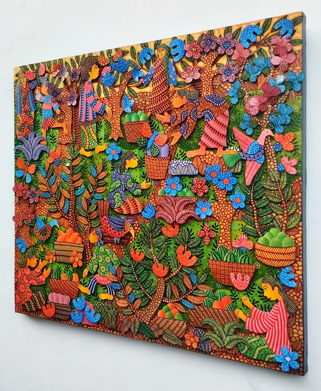 A colorful painting on a wall in a room.