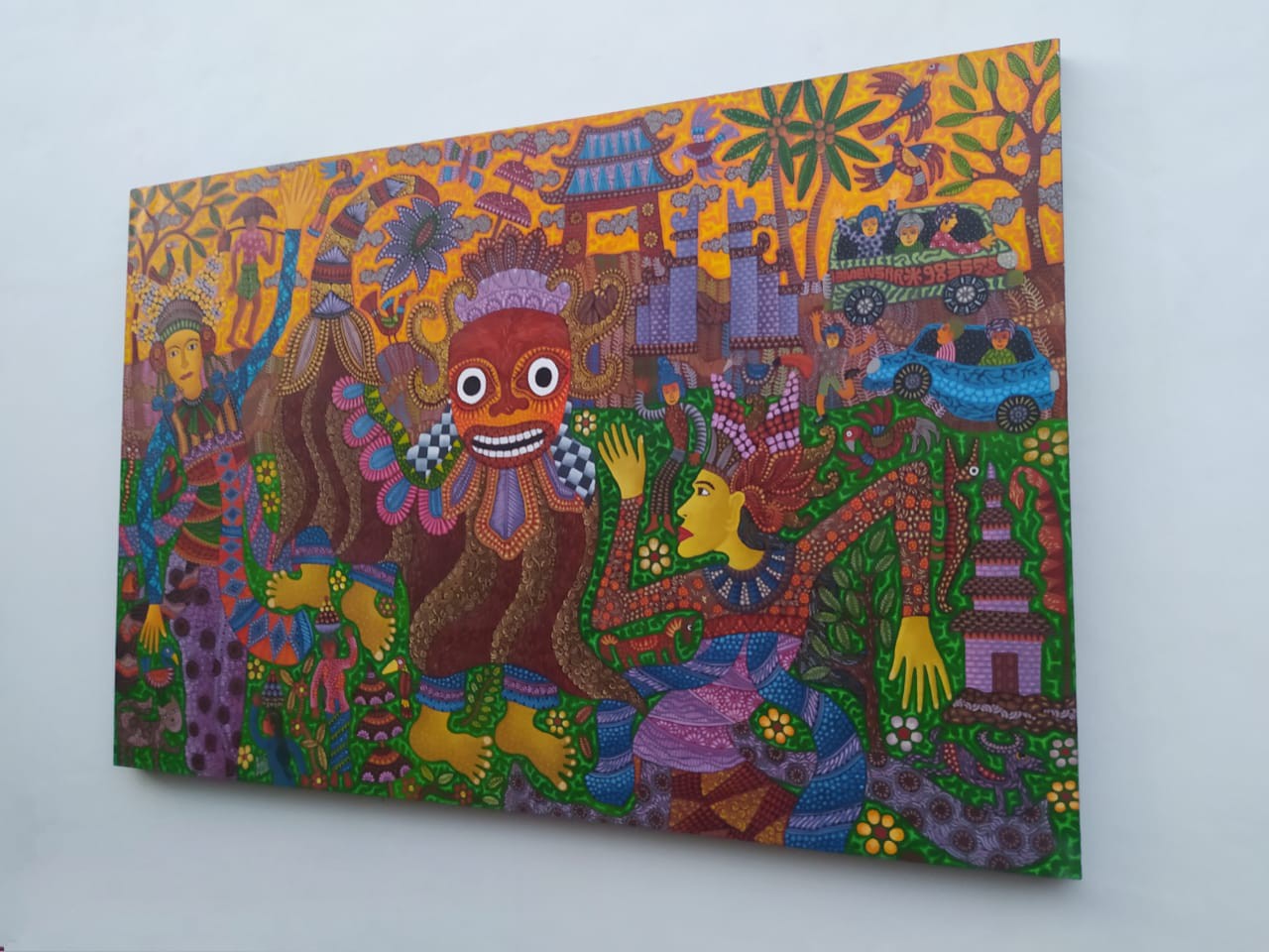 A painting on a wall in a room. 