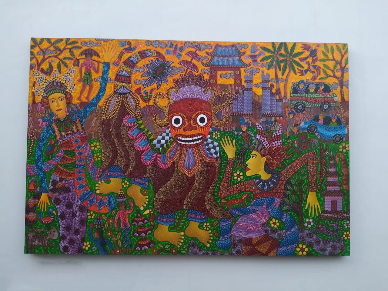 A painting on a wall in a room. 