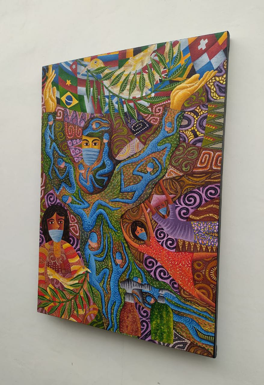 A vibrant, patterned painting of a central tree-like figure with multiple faces and figures, surrounded by flags and nature elements.