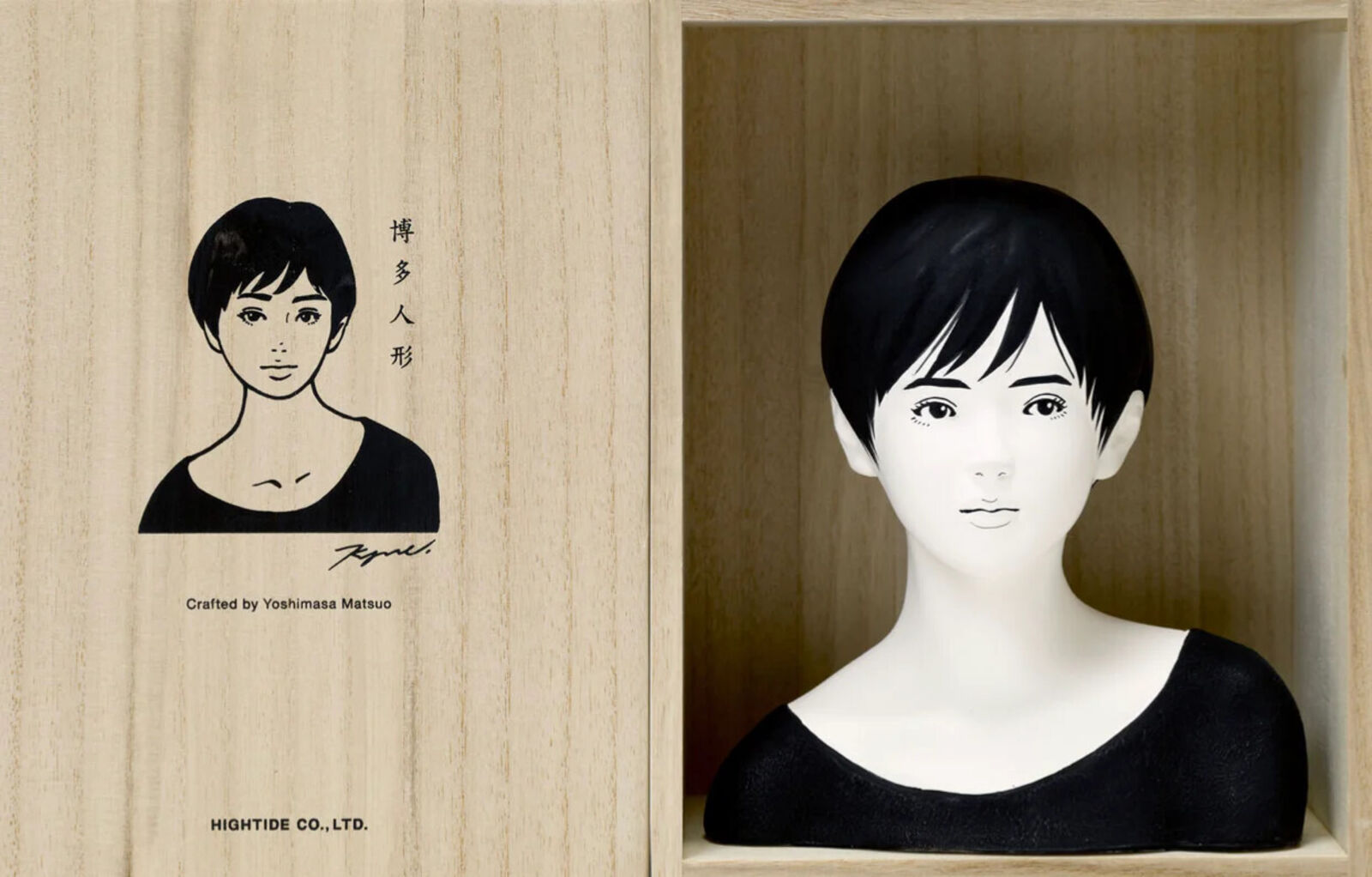 A mannequin head with a black wig on a white background.