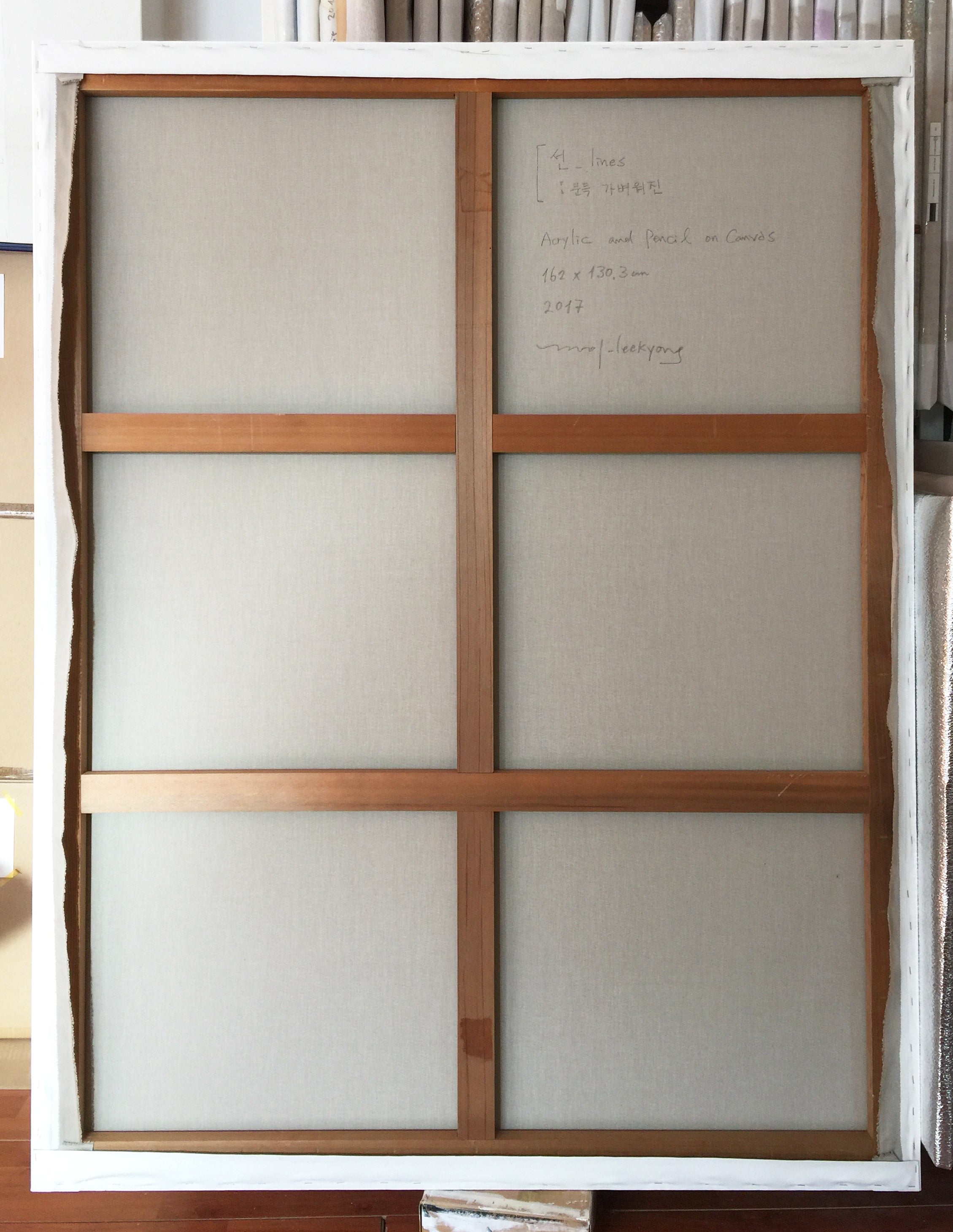 A painting of colorful lines on a white background.