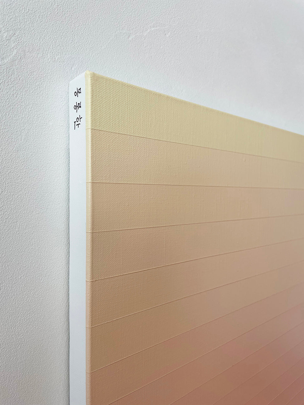 A red and beige ombre background with a white border.
