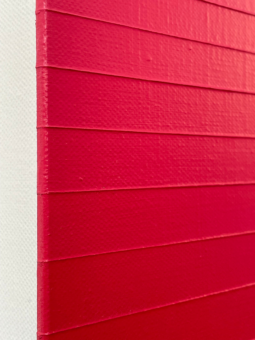 A red and beige ombre background with a white border.