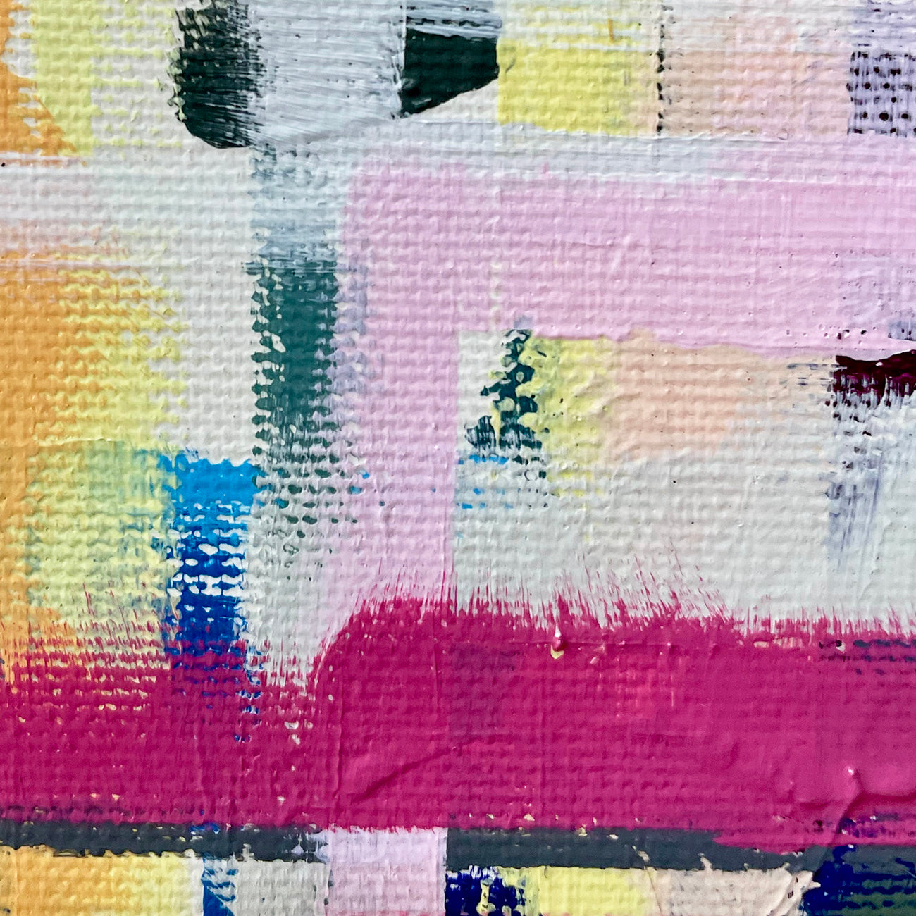 A painting with pink, blue, yellow, and green squares on a white background.