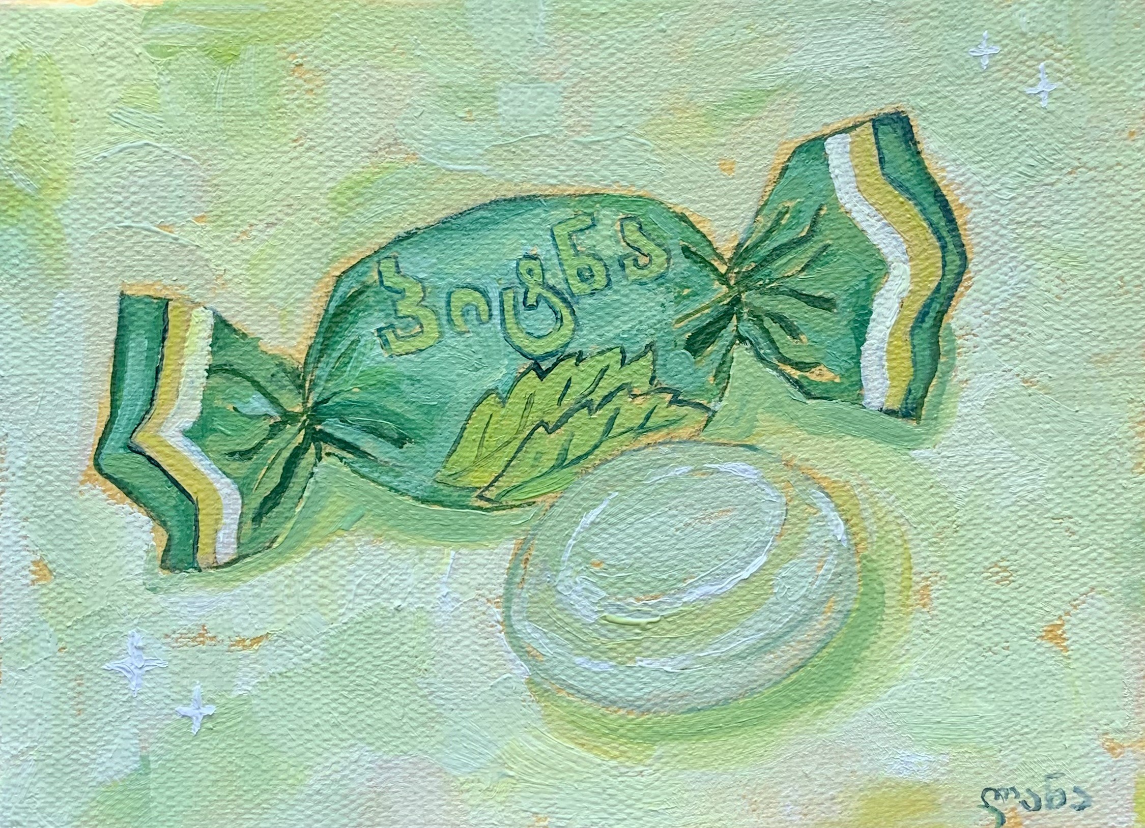A painting of a green and yellow candy on a green background.