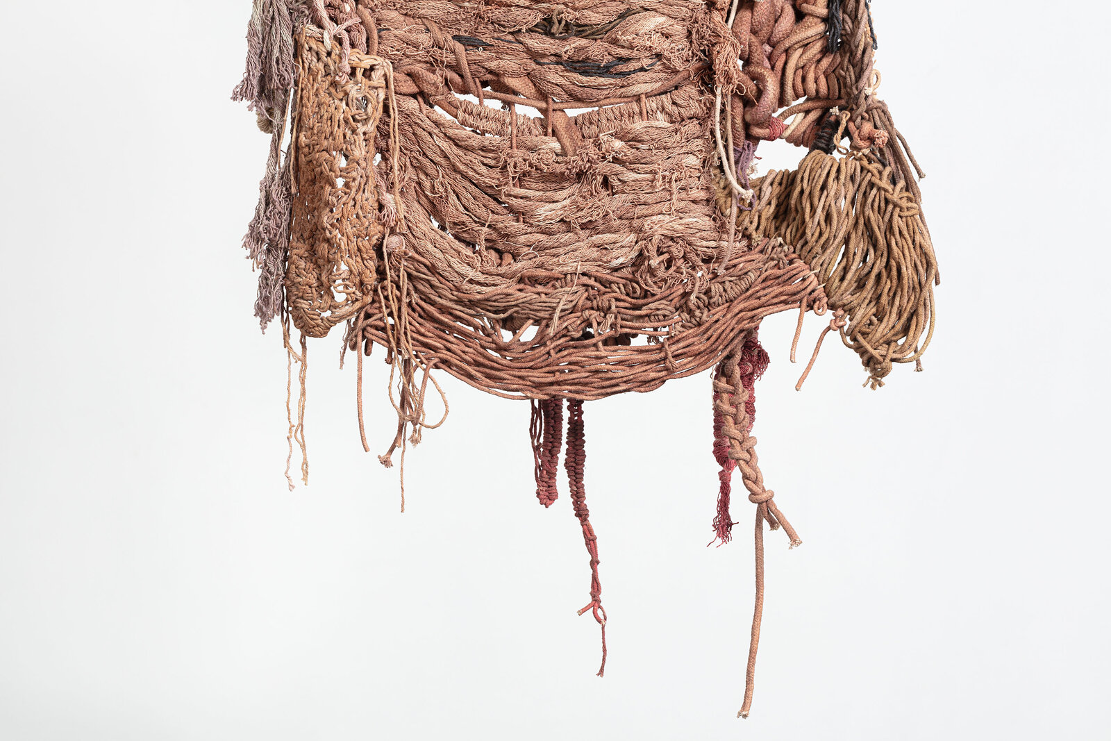 Artwork by Laura Lima, Caboclinho do Mato, Made of Raw cotton threads dyed by natural pigments 