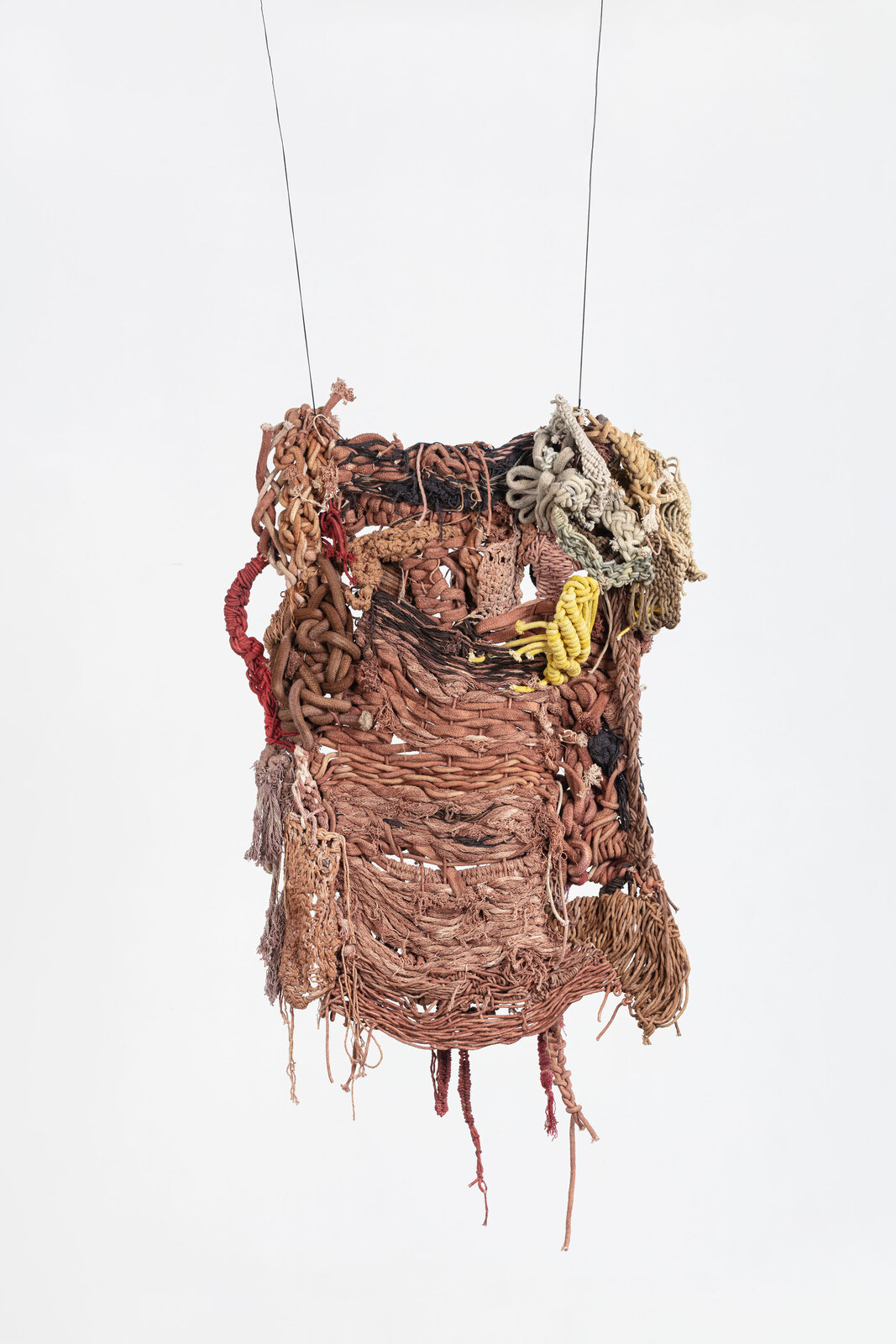 Artwork by Laura Lima, Caboclinho do Mato, Made of Raw cotton threads dyed by natural pigments 