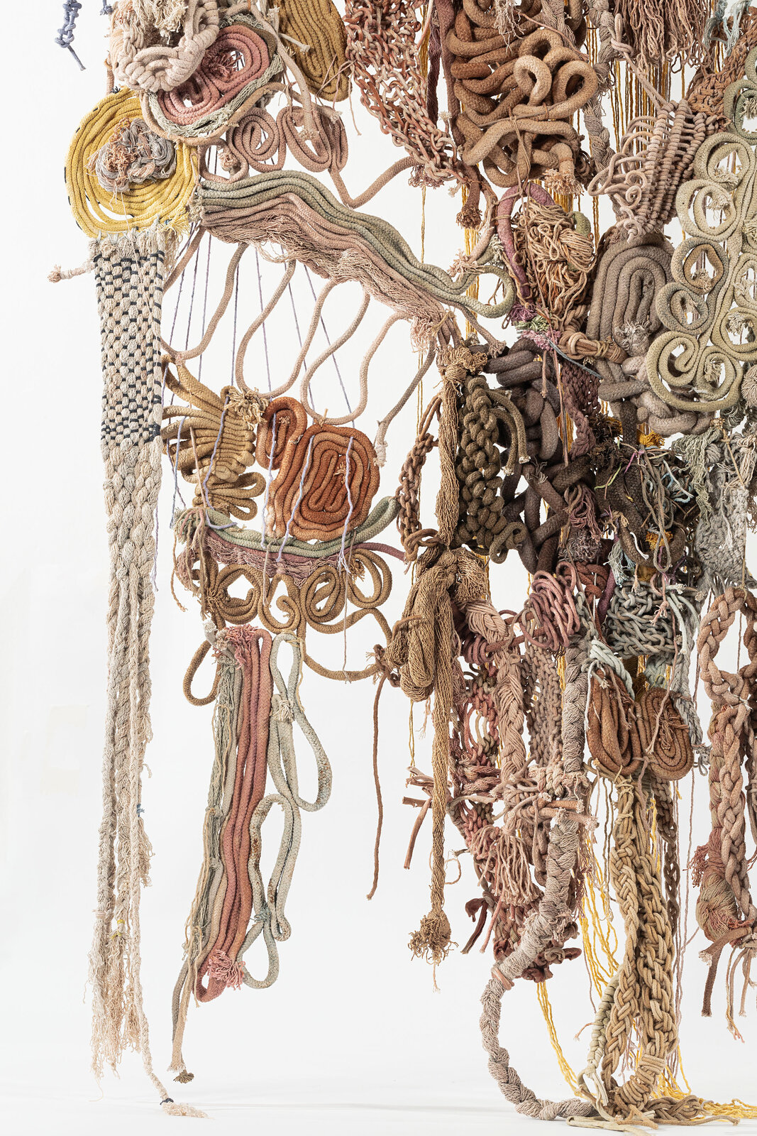 Artwork by Laura Lima, Irapuru, Made of Raw cotton threads dyed by natural pigments and wire 