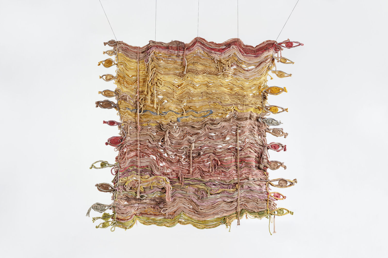 Artwork by Laura Lima, Anhanguรก, Made of Raw cotton threads dyed by natural pigments 