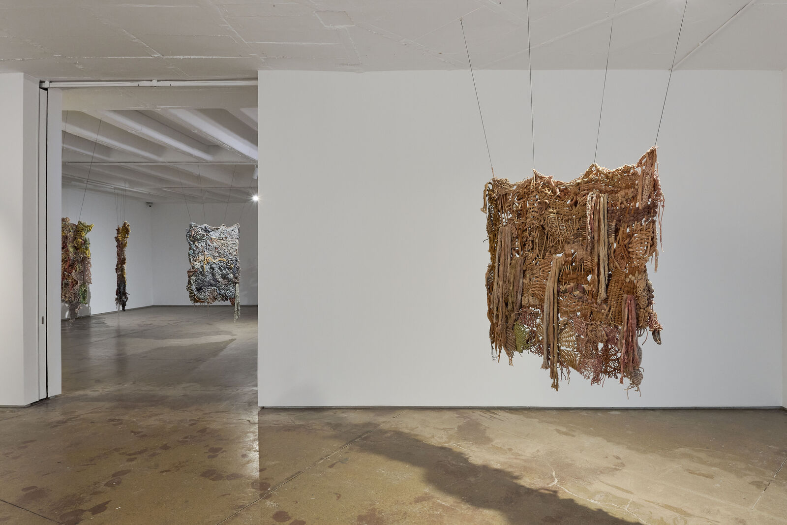 Artwork by Laura Lima, Chupa Cabra, Made of Raw cotton threads dyed by natural pigments 