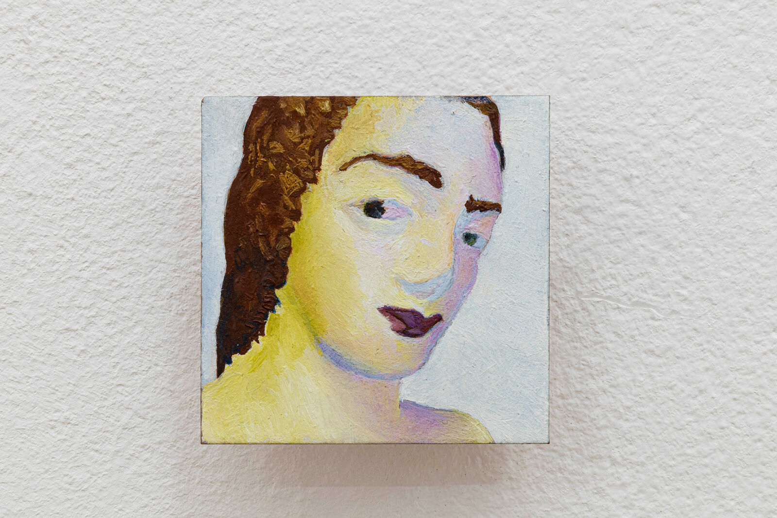 A small oil painting of a face with bold, textured brushwork and a muted color palette.