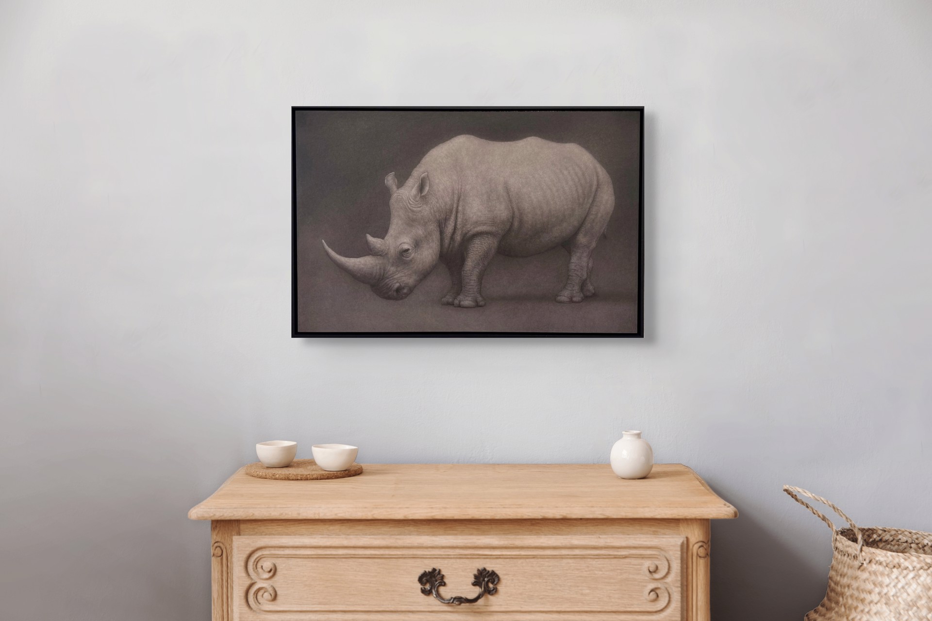 A drawing of a rhino on a black background.