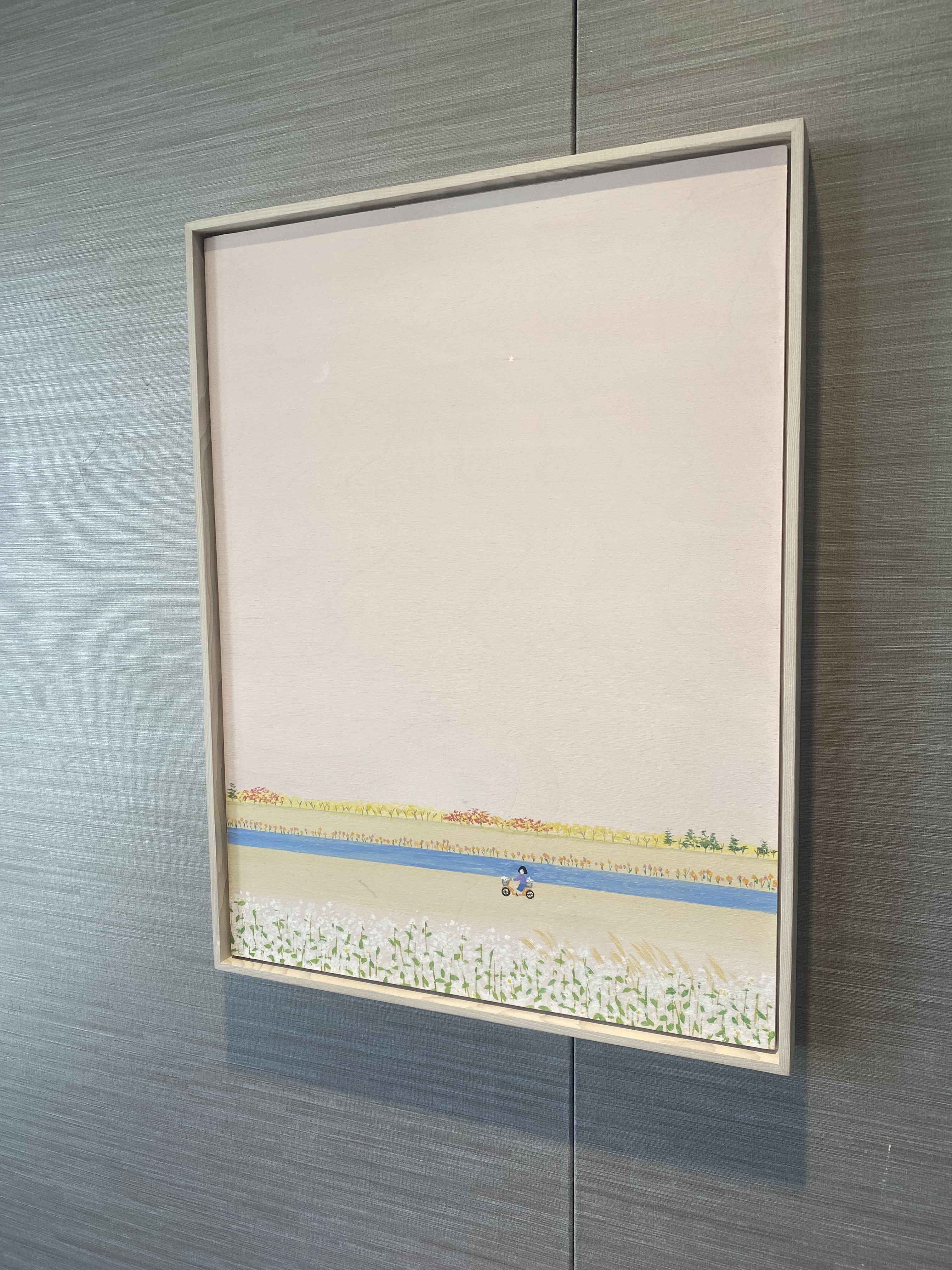 A minimalist landscape painting featuring a distant figure on a bicycle against a layered horizon of fields and sky.