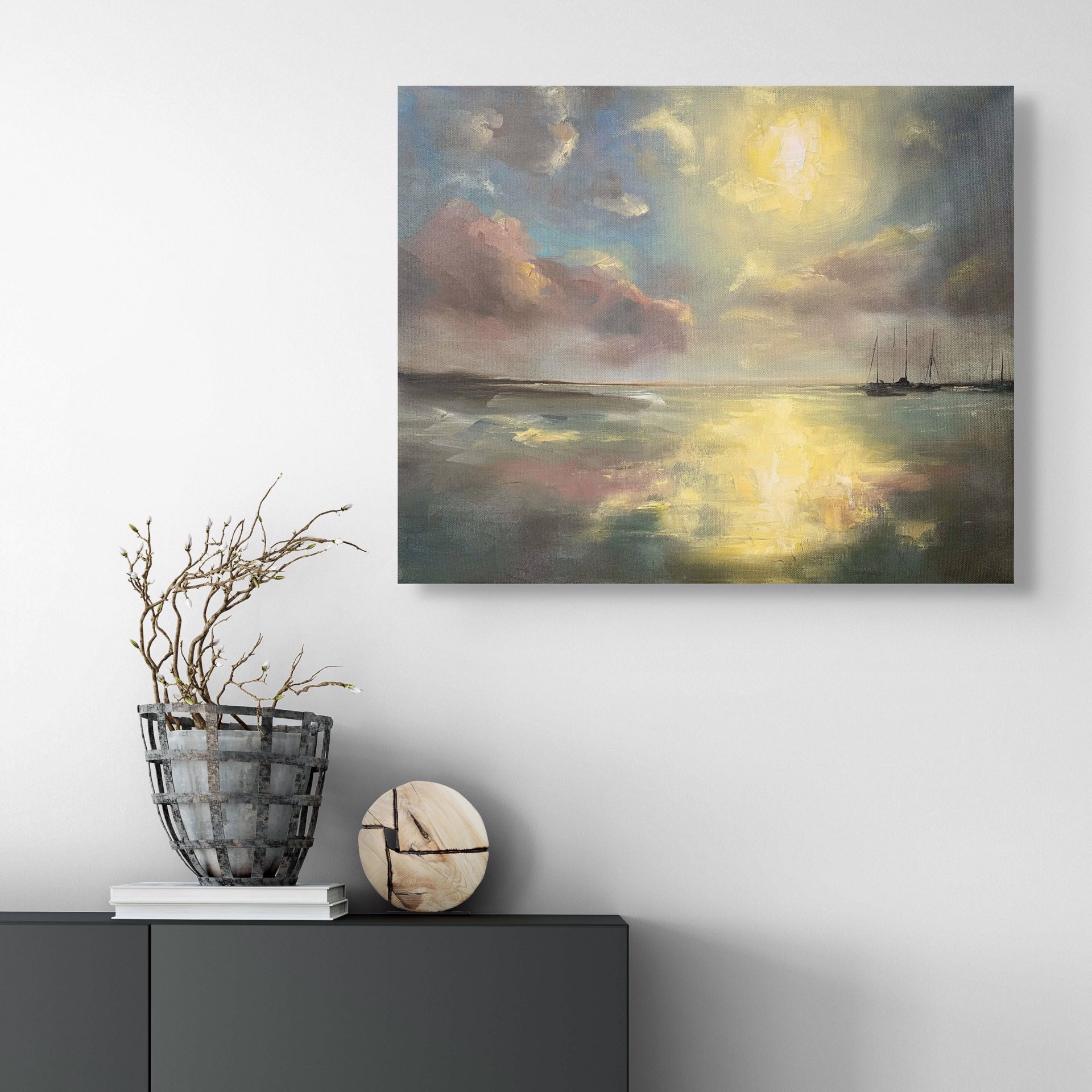 A seascape painting of a calm bay at sunset with anchored sailboats.