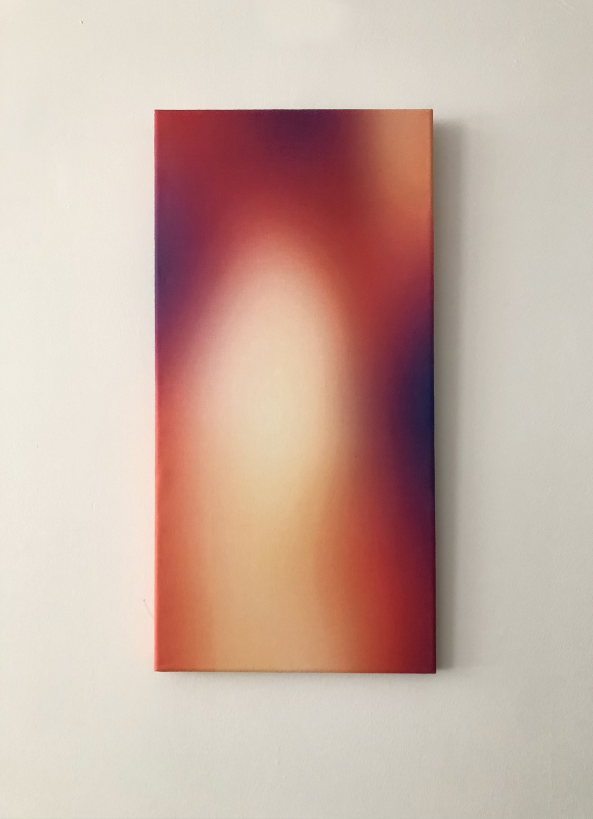 A soft, abstract gradient blending warm and cool tones.