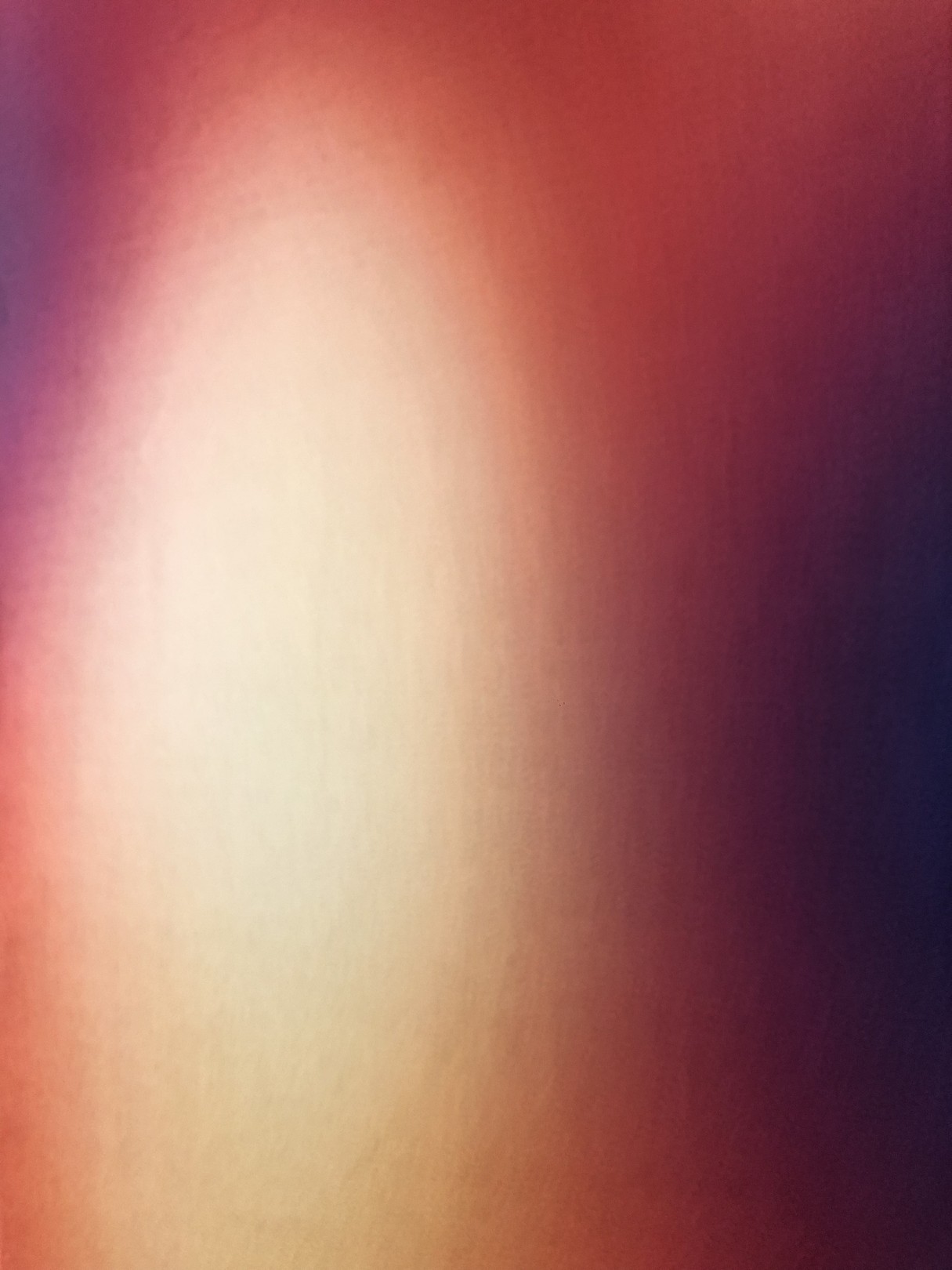 A soft, abstract gradient blending warm and cool tones.