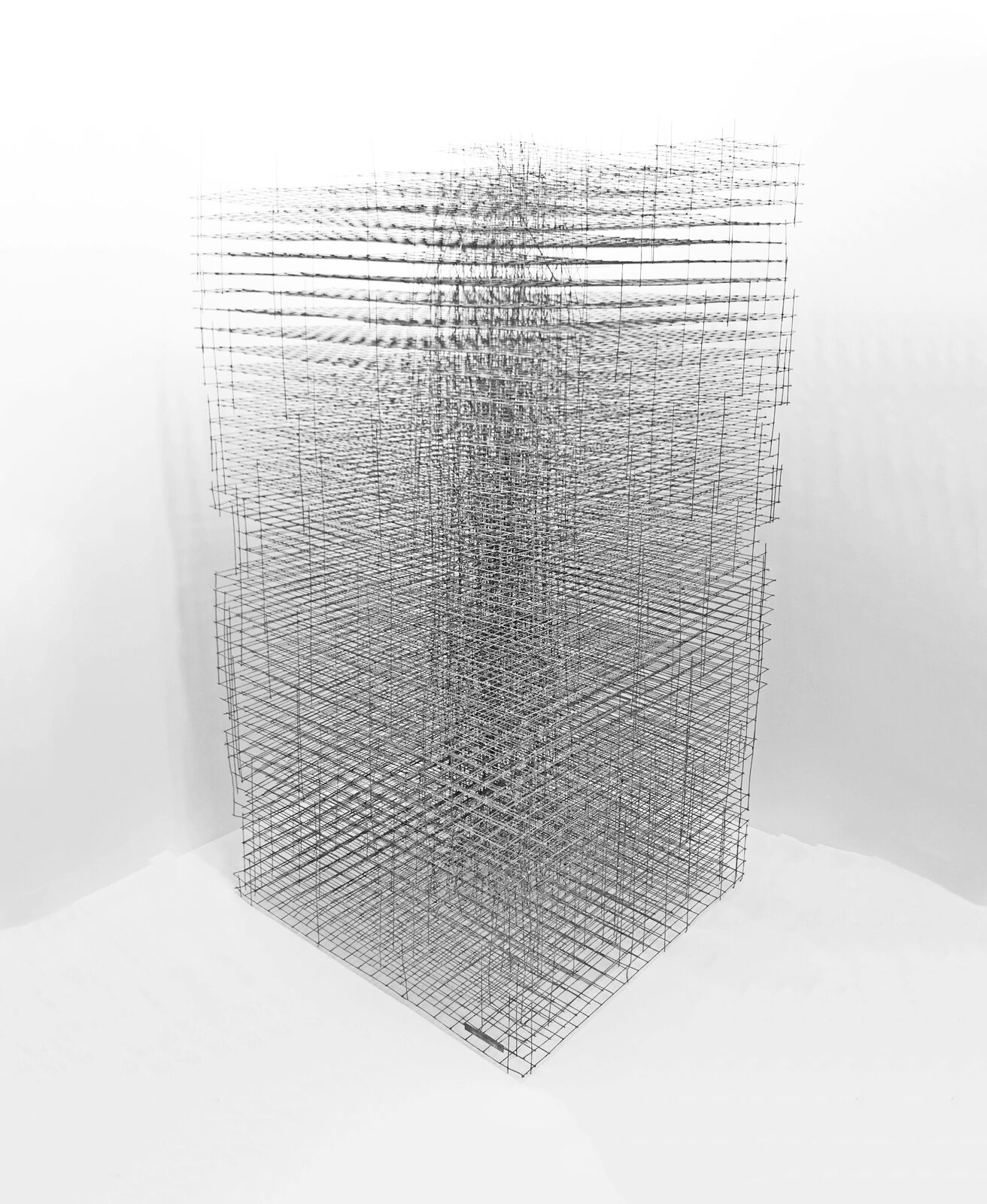 A black and white drawing of a tall building.