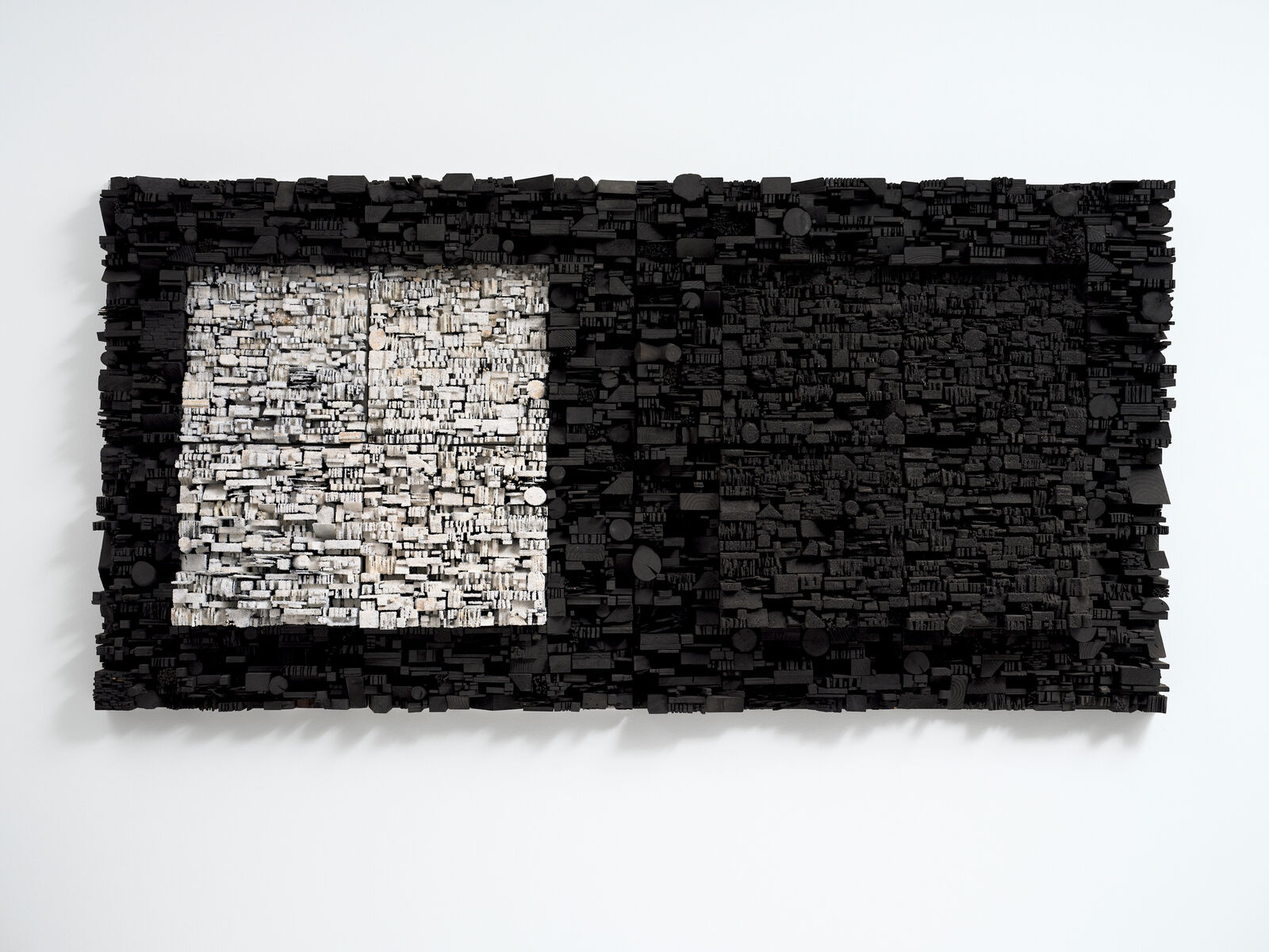 Artwork by Leonardo Drew, Number 443, Made of Wood, paint, plaster and calcium carbonate 