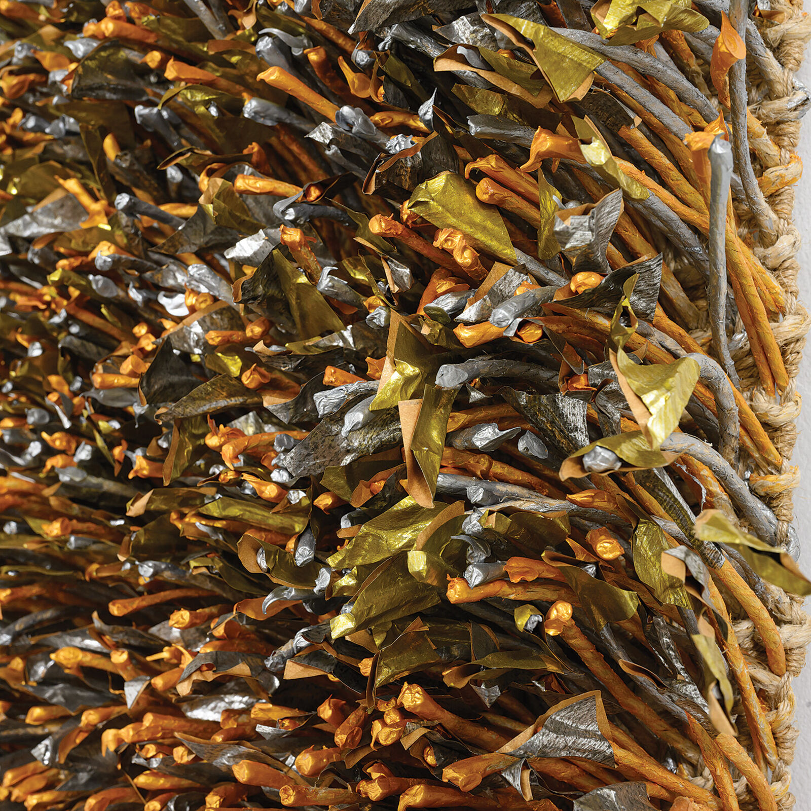 A pile of seaweed on a white surface. 
